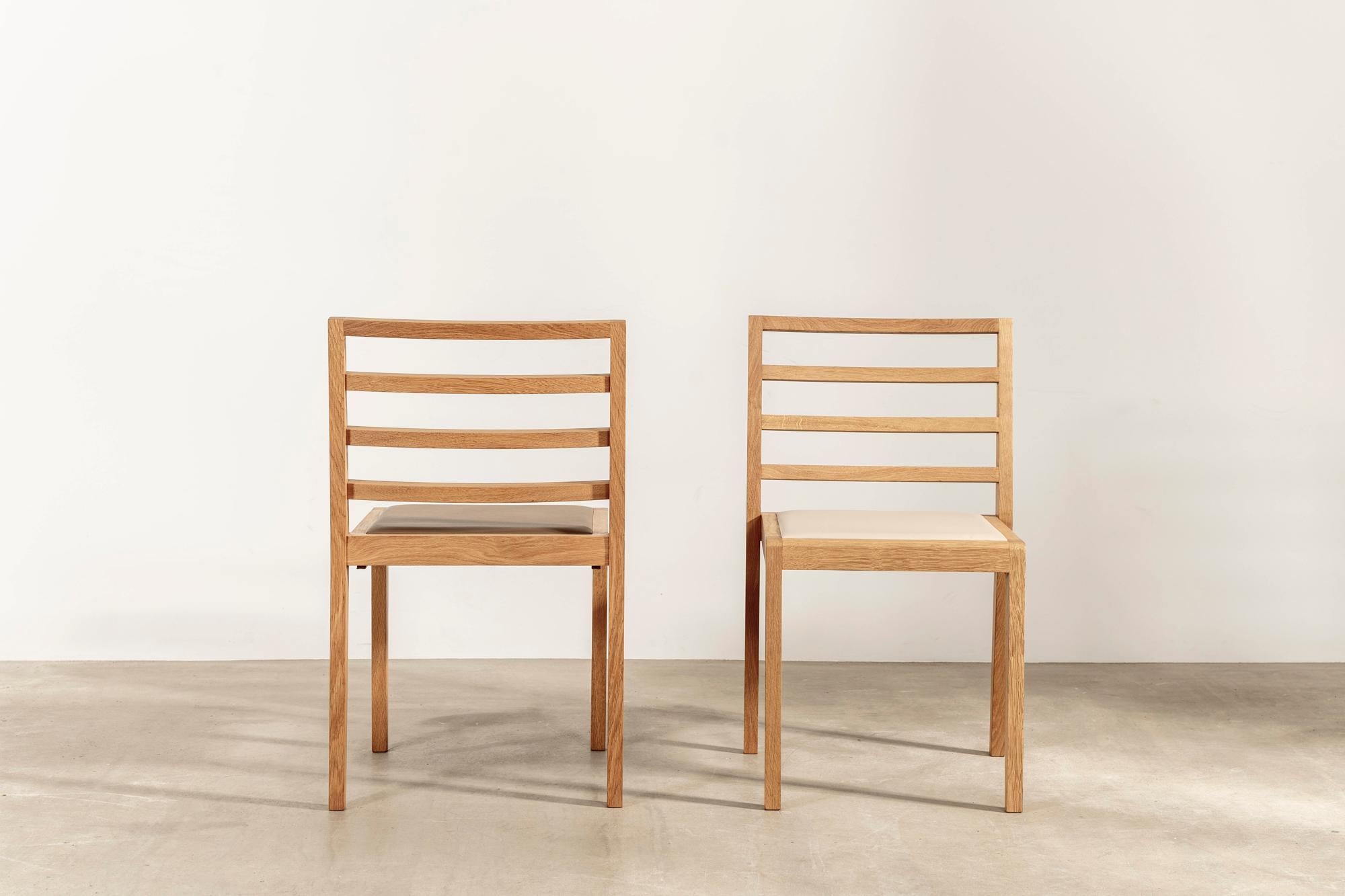 Modern La Discrète No 08, Set of Stackable Chairs in Oak and Leather by Alice Etcaetera For Sale