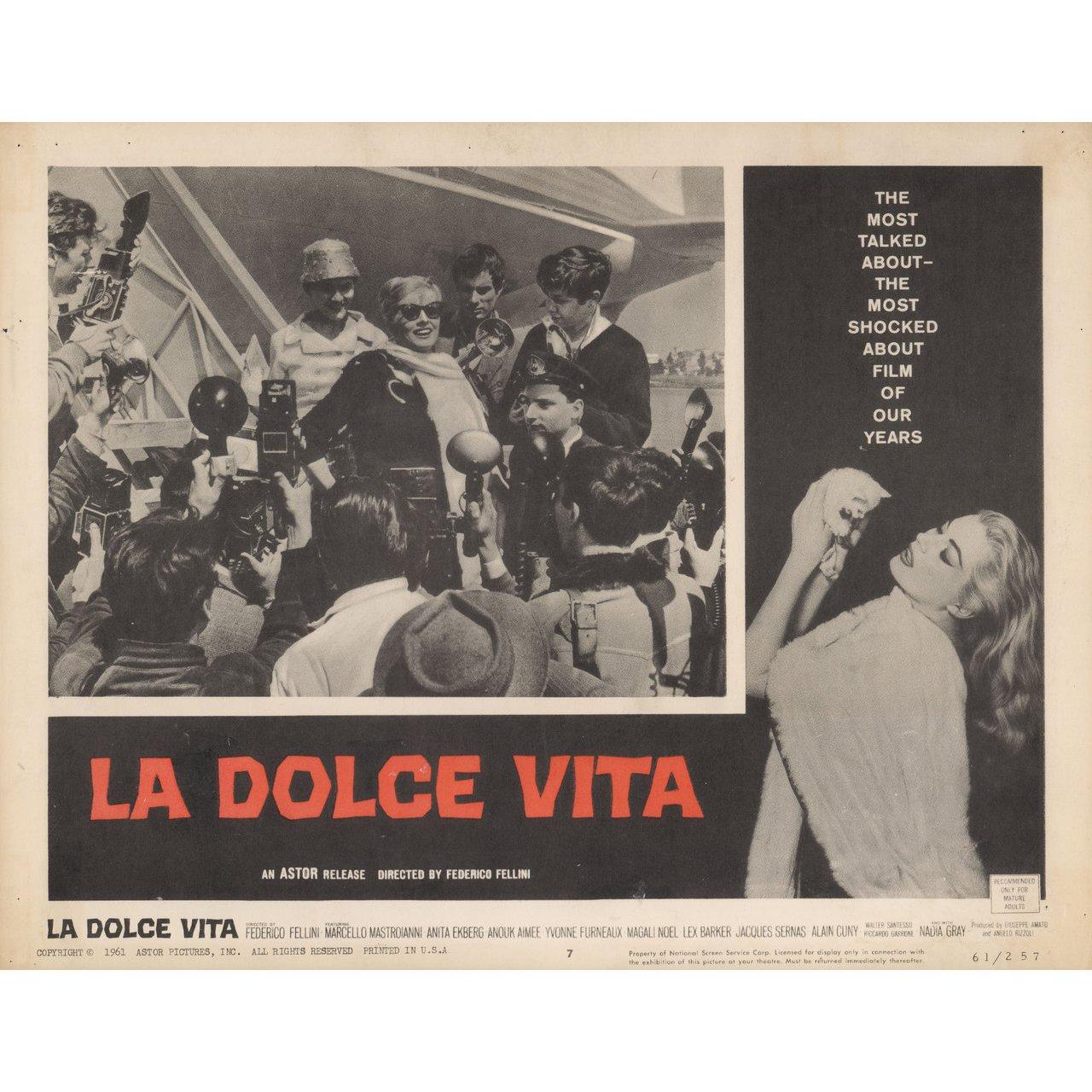 Original 1961 U.S. scene card for the film La Dolce Vita directed by Federico Fellini with Marcello Mastroianni / Anita Ekberg / Anouk Aimee / Yvonne Furneaux. Very Good-Fine condition, pinholes. Please note: the size is stated in inches and the