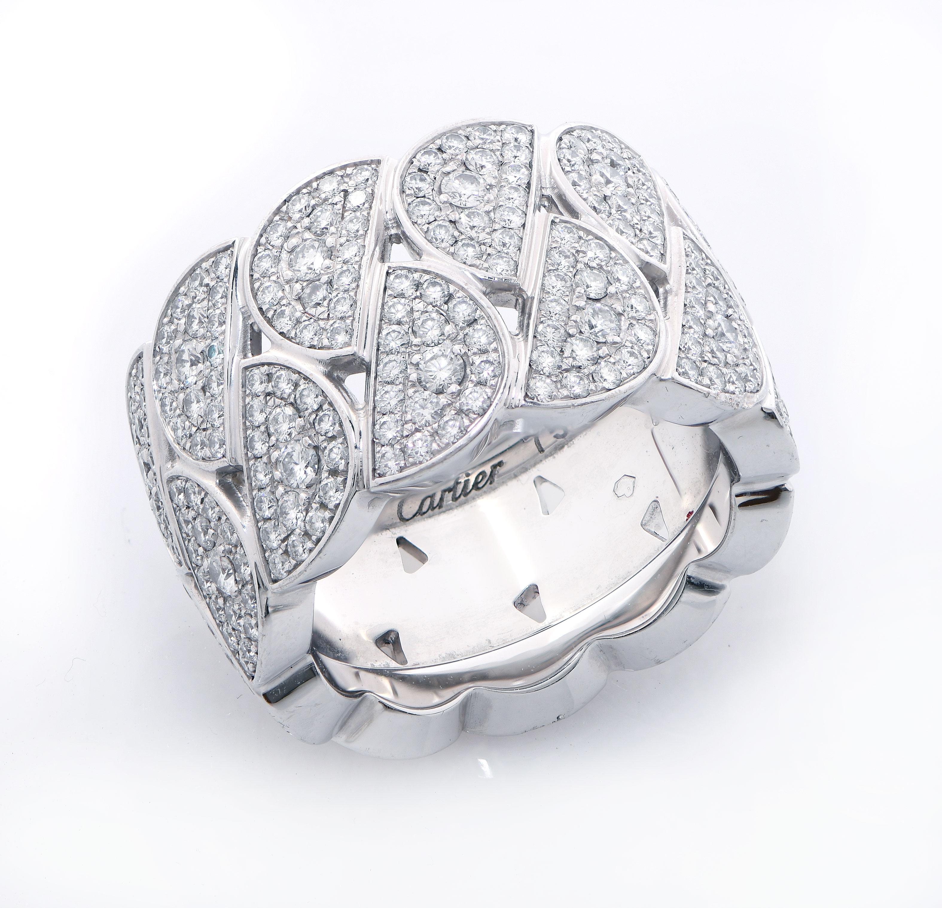 La Dona de Cartier Diamond Band in 18 Karat White Gold. This gorgeous ring is adorned with 374 round brilliant cut diamonds with a total estimated weight of 2.6 carats. These diamonds are Colorless and VVS2 and above in clarity. The La Dona