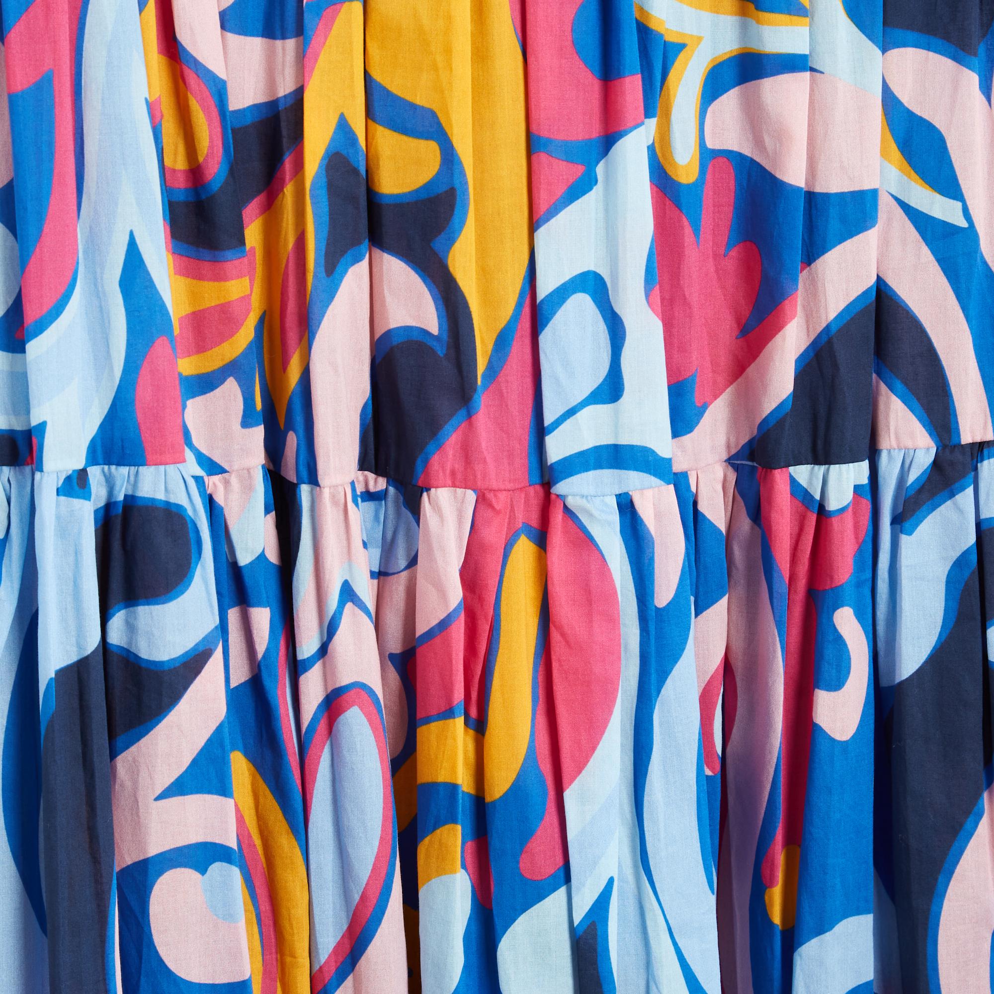 La Double J long dress, Jennifer Jane model in cotton poplin printed with large multicolored floral-inspired patterns, deep V-neckline, 4 ruffles from the chest, 2/3 ruffled sleeves, unlined. Size L or 40FR: shoulders 44 cm, chest 48 cm, length 134