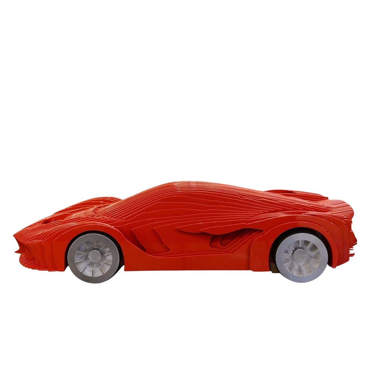 Escultura La Ferrari con toda la estructura en piezas de aluminio ensambladas
(4 mm de grosor), todo pintado con pintura original Ferrari rosso corsa.
Edición limitada de 8 piezas, numeradas 2/8. Pieza excepcional.