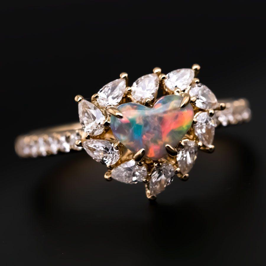 Lightning Ridge Black Opal & Diamond Engagement Wedding Ring in 18k Yellow Gold.

Design name: La Fiesta!


Design idea: 10 pear-shaped diamonds dance around with a vivid bright black opal.

Free Domestic USPS First Class Shipping! Free Gift Bag or