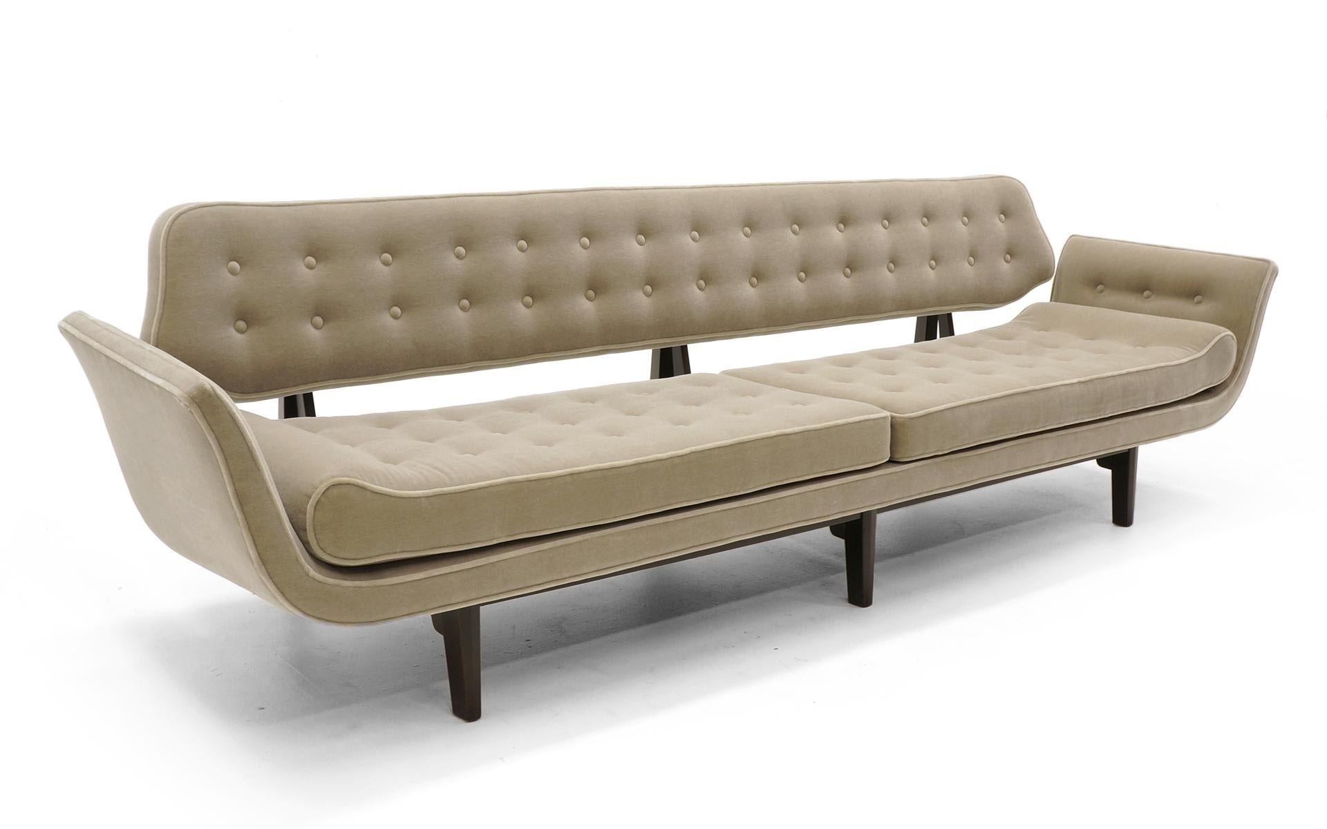 Edward Wormley's famous La Gondola sofa. One of the best sofa designs of the entire modern design movement. Expertly refinished and reupholstered in a light to medium grey mohair. Plush and elegant.