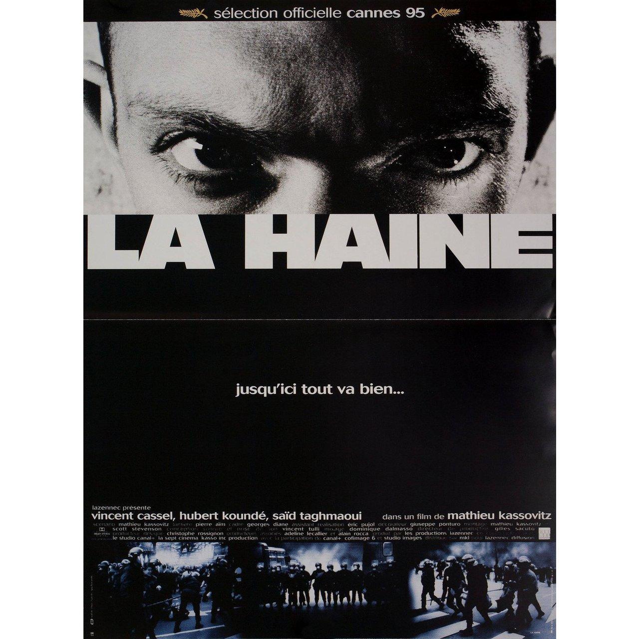 Original 1995 French petite poster for the film La Haine (Hate) directed by Mathieu Kassovitz with Vincent Cassel / Hubert Kounde / Said Taghmaoui / Abdel Ahmed Ghili. Fine condition, folded. Many original posters were issued folded or were