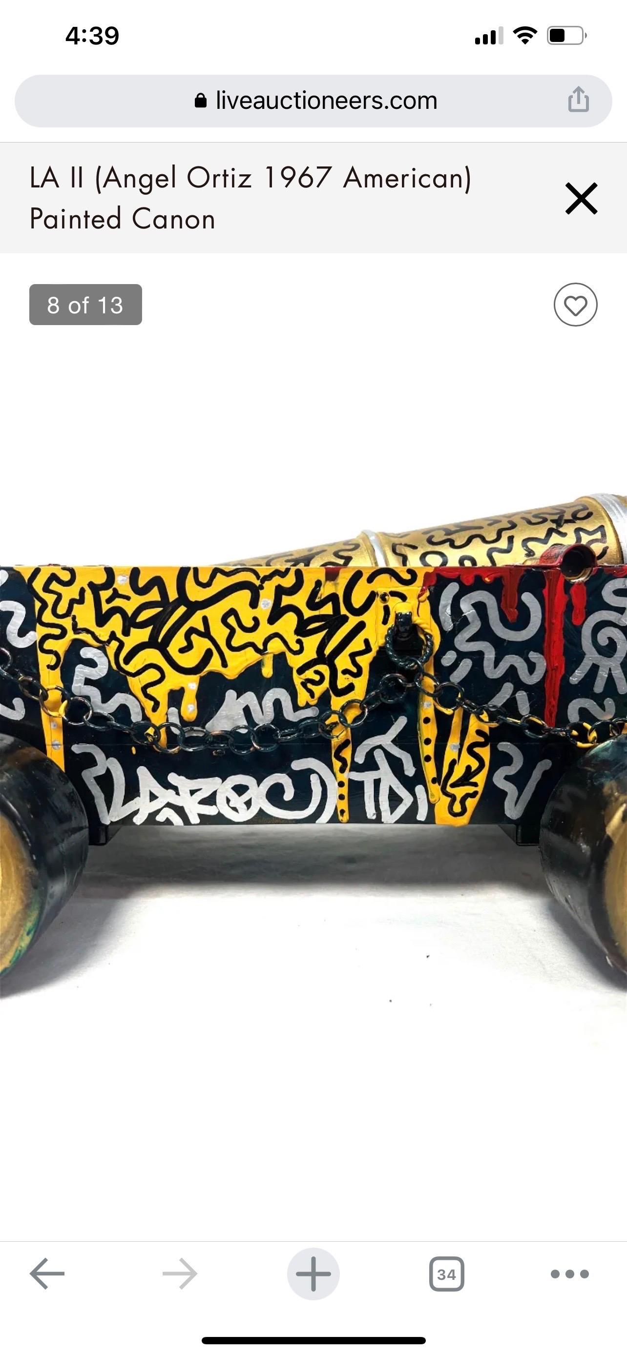 Graffiti Painted Cannon 
Mixed media, wood and hard plastic with metal chain on one side
Circa 1990's
Dimensions: 29