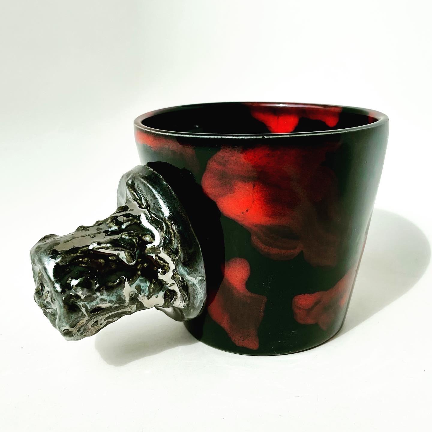 La Lava V, shown here in Diffused China Red/Raven and Broken Silver, the food safe vessel for your favorite beverage of choice, entertaining, or as a decorative object or object d'art. Versatile, sustainable and one of kind, made of recycled
