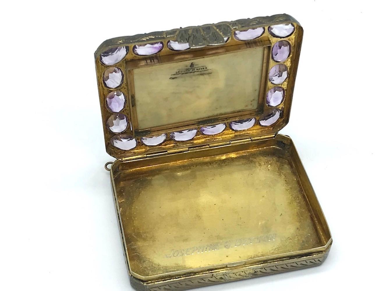 Renaissance 36 carat Amethyst Compact Necklace 
Rare find 3.5 x 2.75 inch metal box with Hand Painting picture of 17th Century and signed by artist. Excellent colors and artistry surrounded by 18 oval shaped amethyst gemstones. The weight is