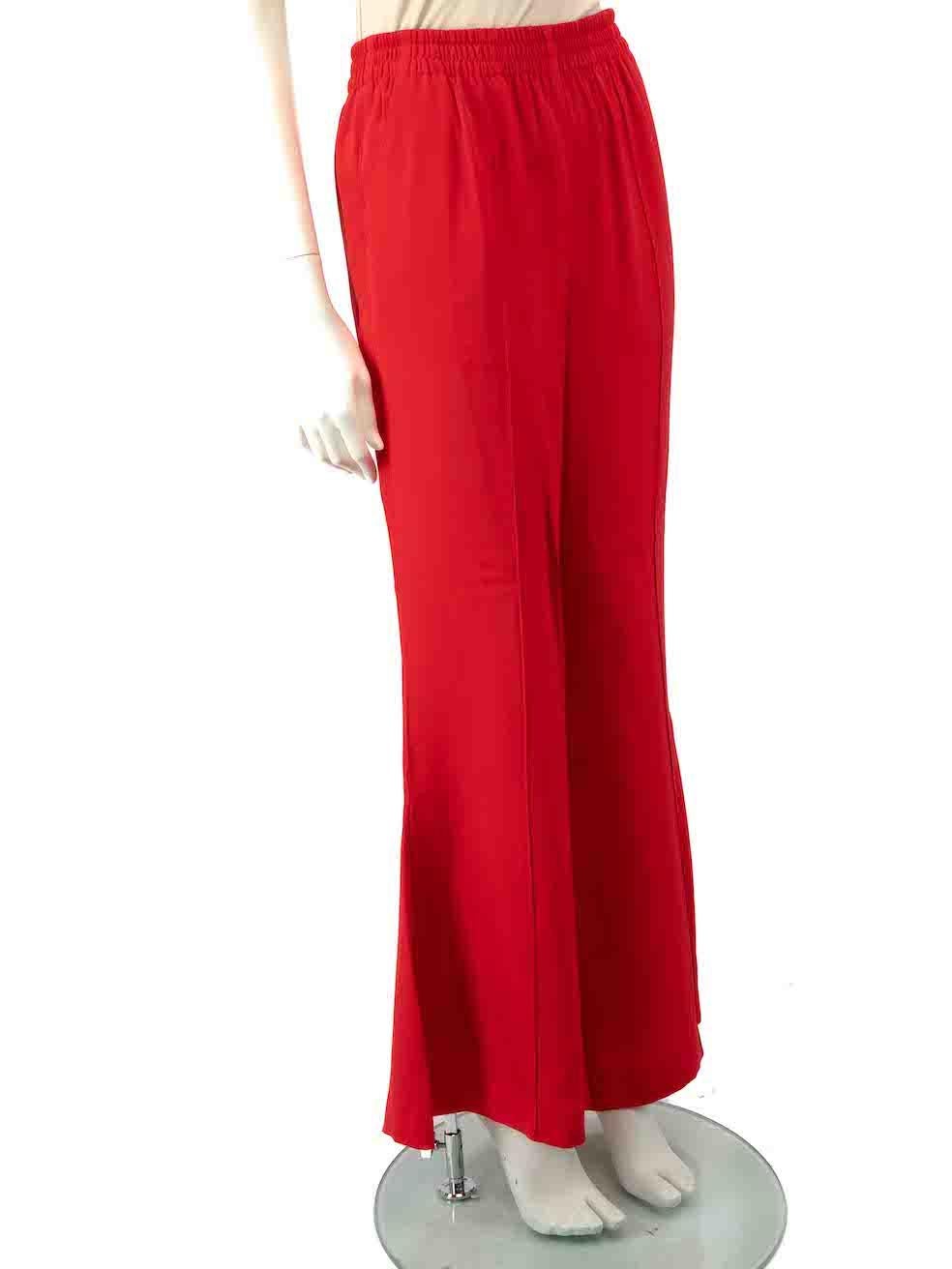 CONDITION is Very good. Hardly any visible wear to trousers is evident on this used La Ligne designer resale item.
 
 
 
 Details
 
 
 Red
 
 Silk
 
 Trousers
 
 Wide leg
 
 Elasticated waistband
 
 2x Side pockets
 
 Leg slit
 
 
 
 
 
 Made in