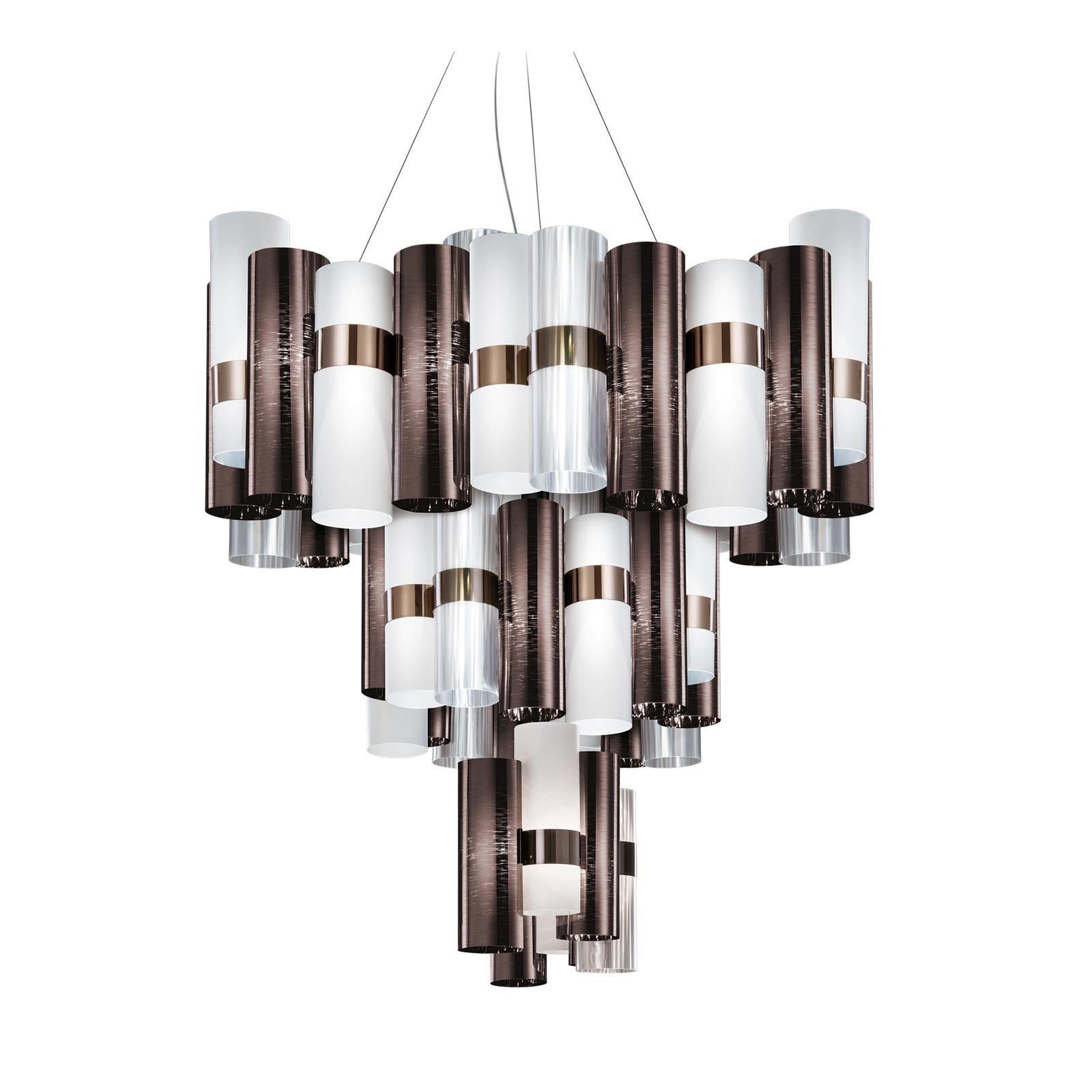 This stunning ceiling lamp is part of the La Lollo collection by Lorenza Bozzoli, inspired by the elegance and glamour of the 1950s movies. Entirely made of resistant and completely recyclable engineered plastic, its silhouette comprises a series of
