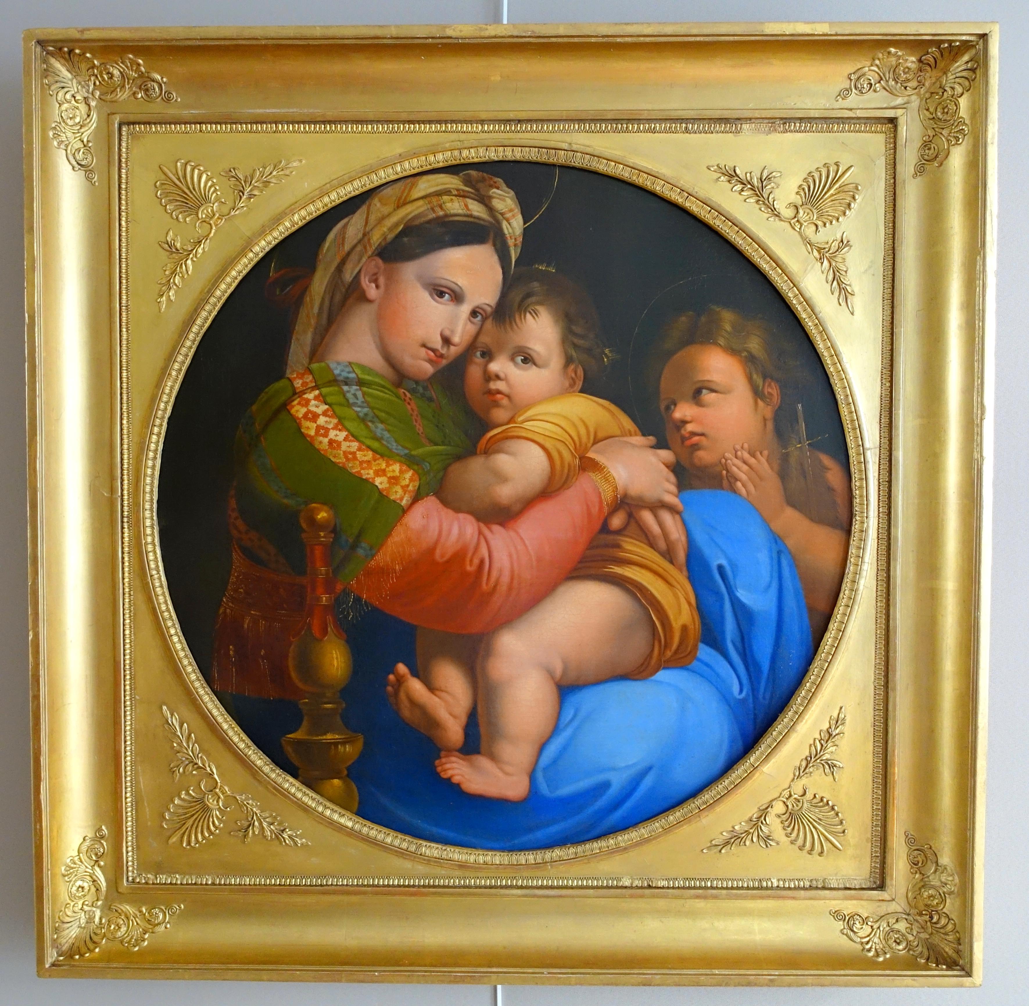 A fine 19th century Italian painting : Madonna and Child with St. John (known as Madonna of the Chair), oil painting on canvas set into its impressive squared gold leaf gilt wood frame with a circular view (original frame) ; it pictures Virgin Mary