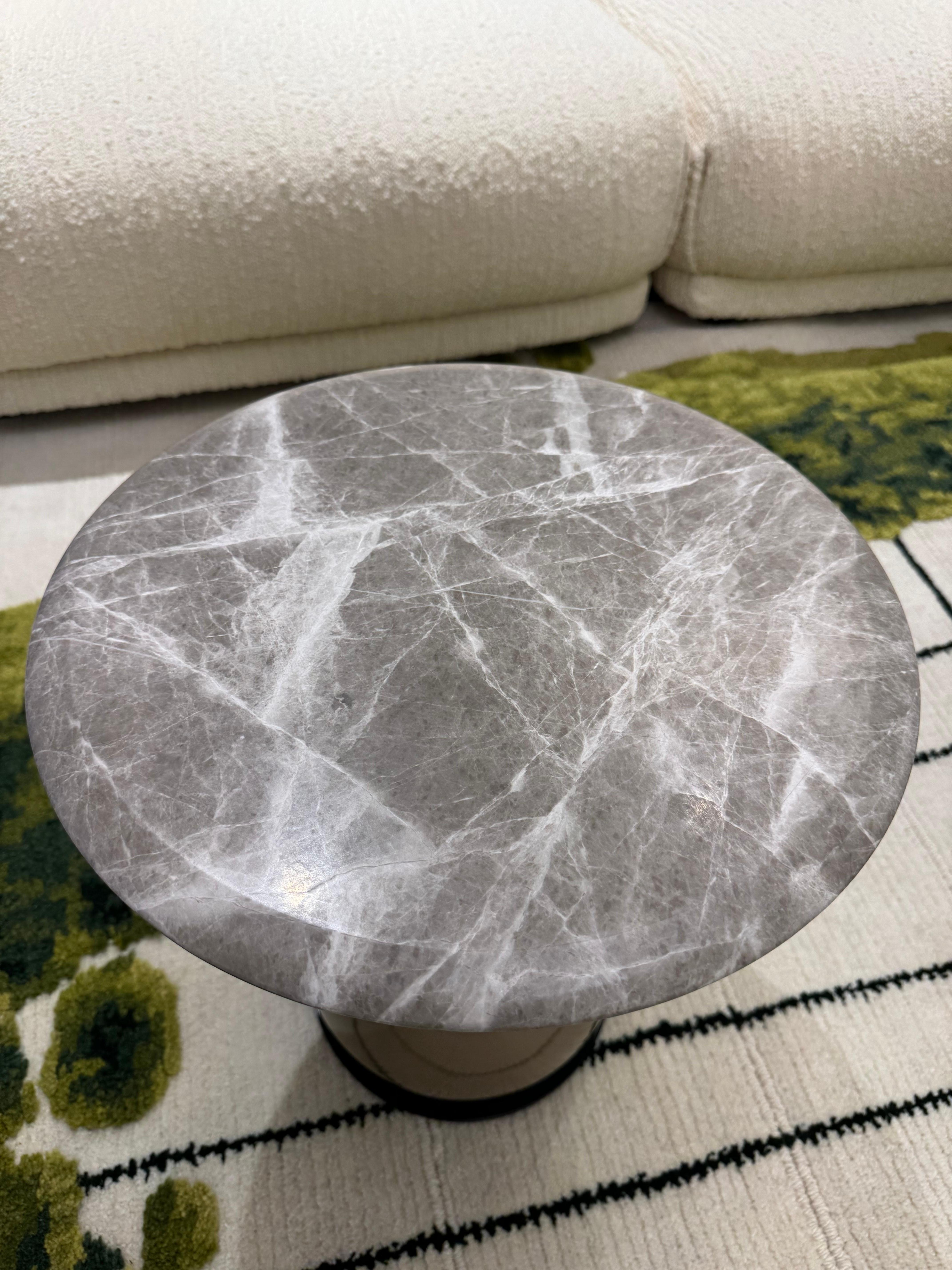Gem Table in Marble
Top in Marble Emperador tundra in 30 mm thickness
Legs in liquid painted Bronze
Size : Dia.400xh430 mm

The Gem table boasts an interactive design. Its configuration is reminiscent of the stacked towers made of round pebbles on