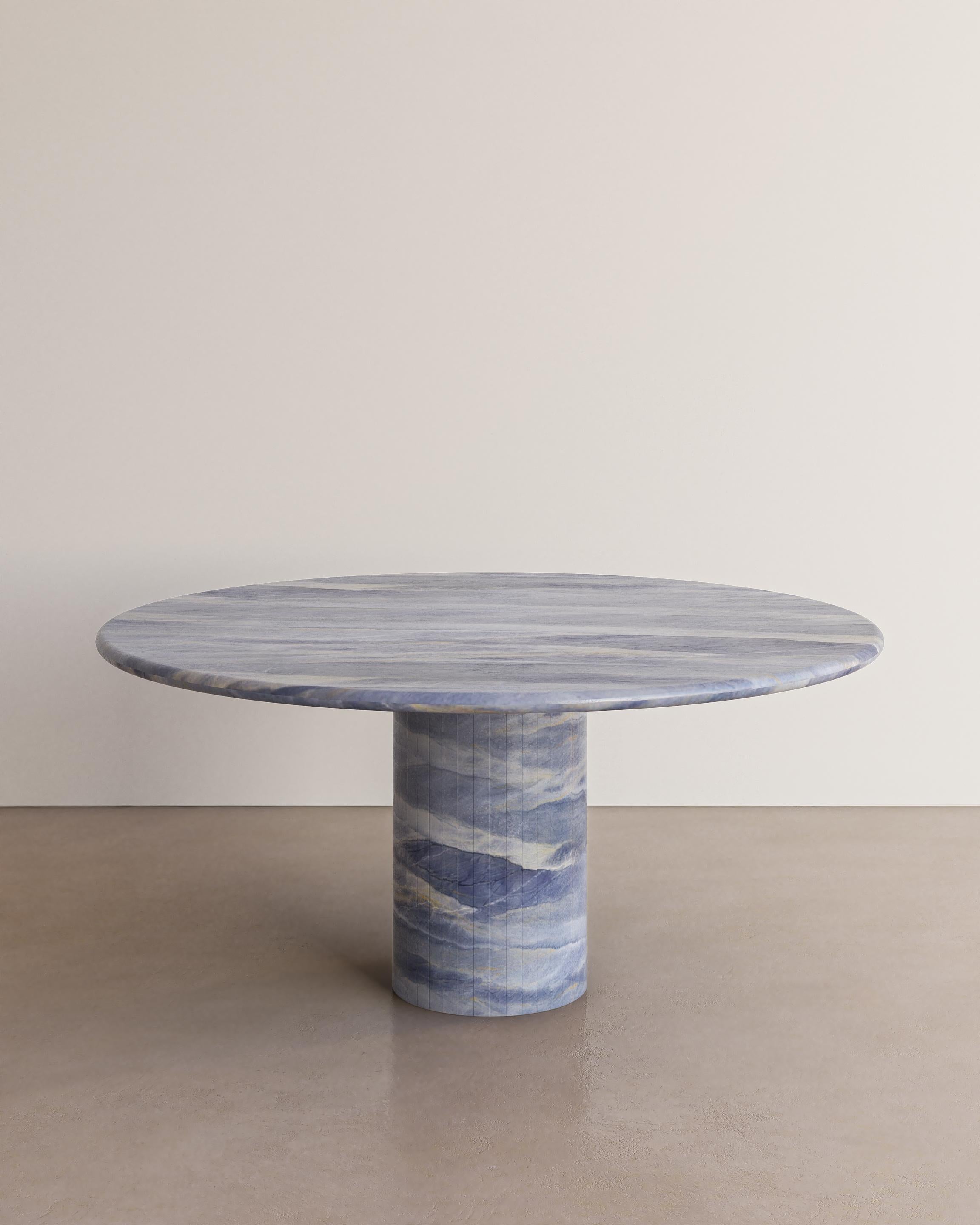 The Voyage Dining Table I in La Mer Quartzite sourced in Brazil with a polished finish by The Essentialist celebrates the simple pleasures that define life and replenish the soul through harnessing essential form. Envisioned as an ode to historical