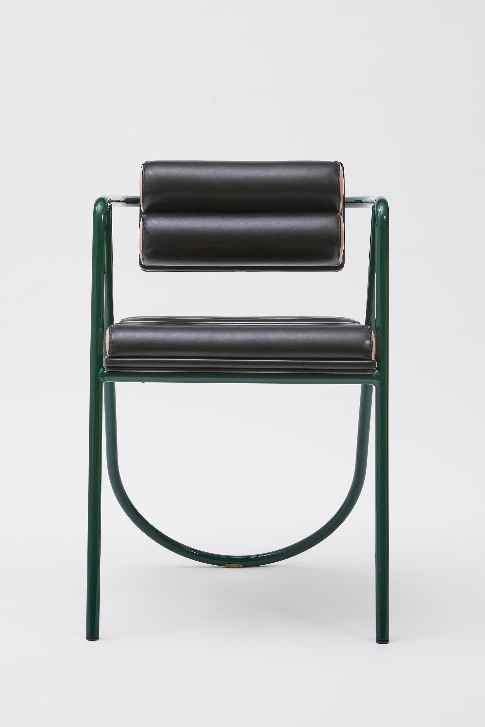 The shapes of La Misciù Chair blend together with the aesthetics of the Spring collection, defining La Misciù Spring Chair. The back and seat, made of synthetic leather, are set on the green-painted steel frame, defining a new connection between the