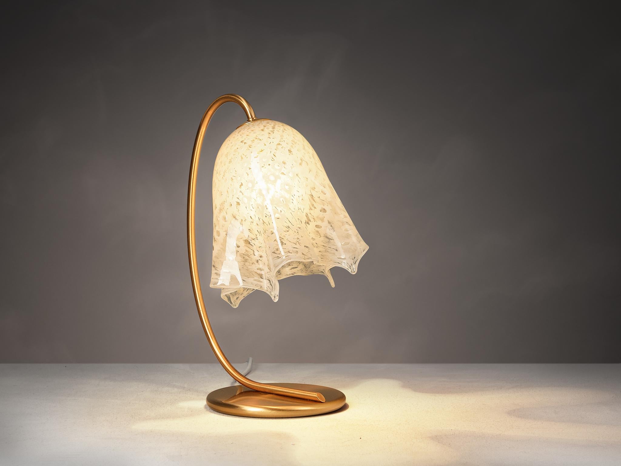 La Murrina, 'Fazzoletto' table lamp, Murano glass, brass-plated metal, Italy, 1970s

A gracious table lamp crafted by La Murrina in Murano during the 1970s, the Fazzoletto earns its name from its elegantly draped lampshade, resembling a