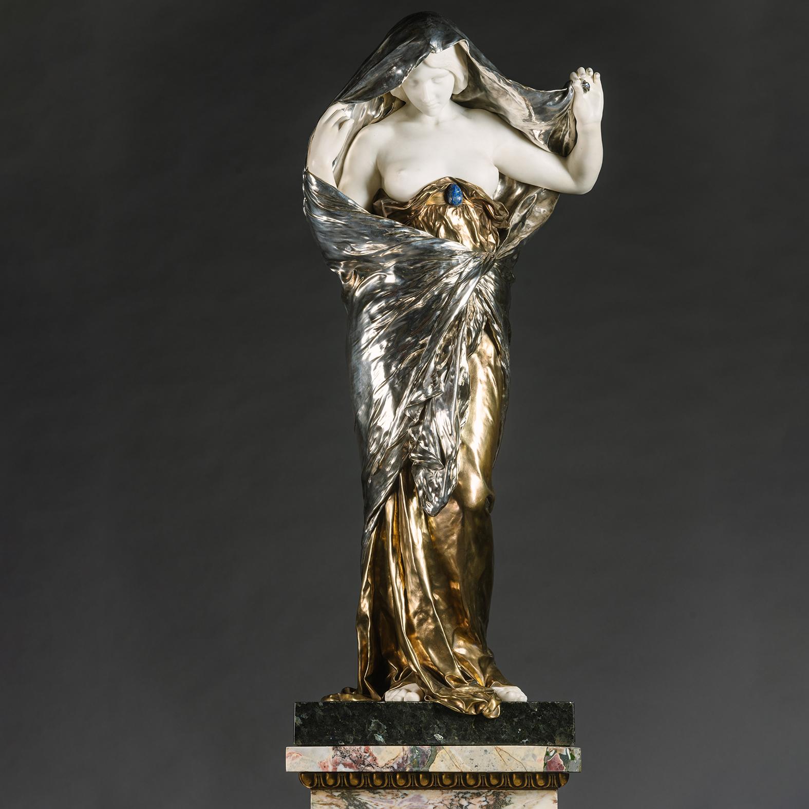 'La Nature se dévoilant devant la Science', A Large and Rare Gilt and Silvered Bronze and Marble Figure entitled  ('Nature unveiling itself before science') By Louis-Ernest Barrias (French, 1841 – 1905).


'La Nature se dévoilant devant la Science'