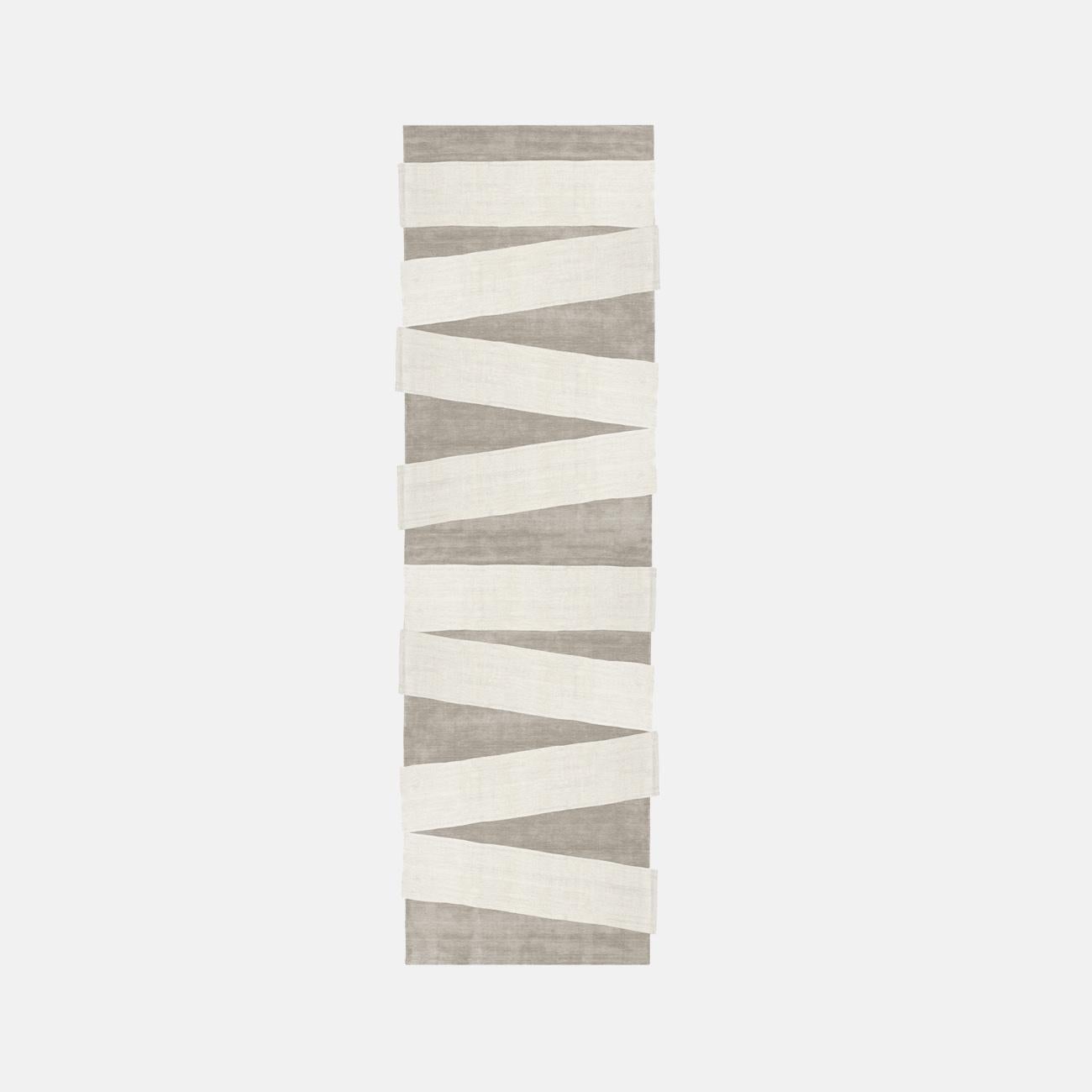 La Nikka Stripes Rug by Atelier Bowy C.D.
Dimensions: W 110 x L 435 cm.
Materials: Wool, silk.

Available in W90 x L360, W100 x L400, W110 x L435 cm.

Atelier Bowy C.D. is dedicated to crafting contemporary handmade rugs for residential and contract