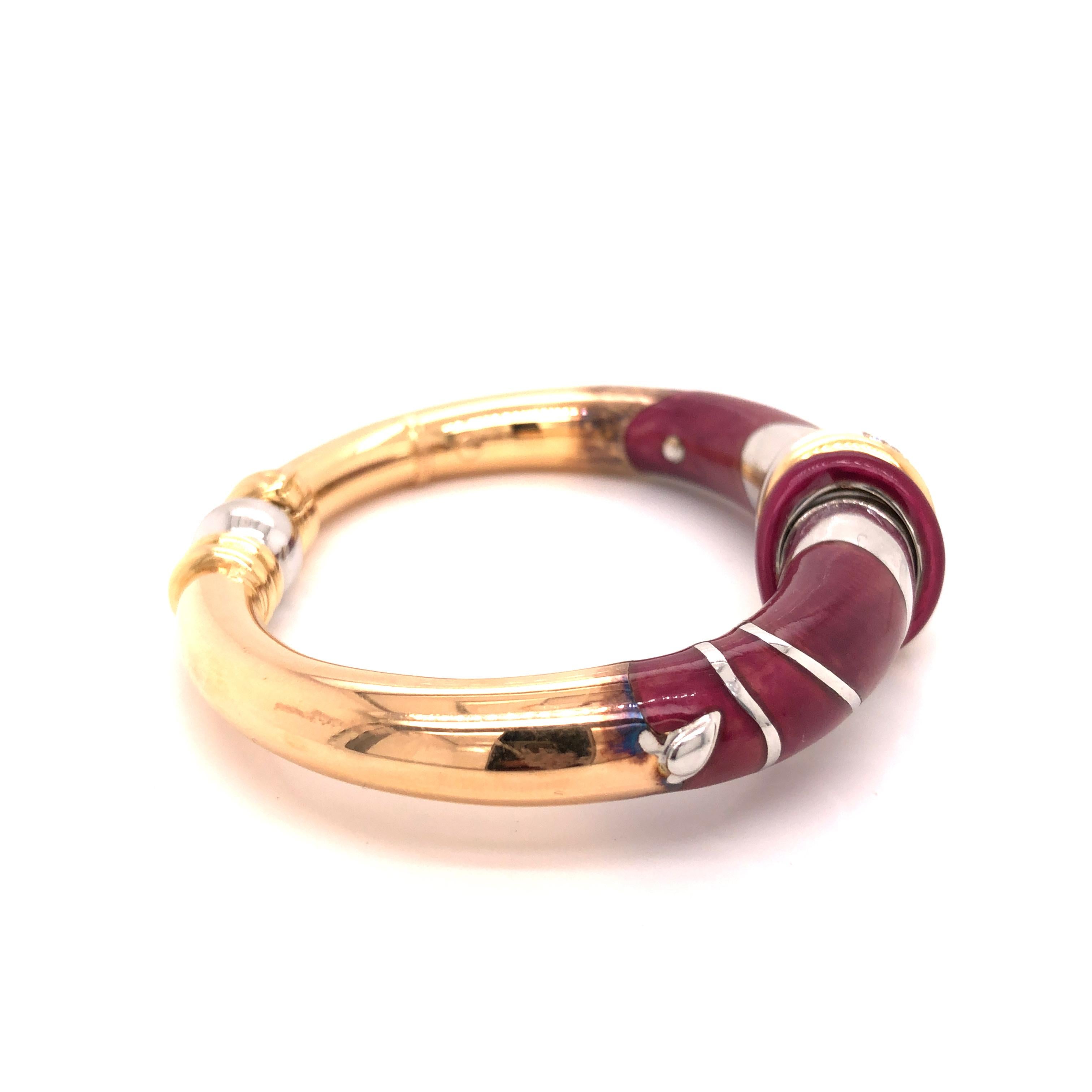 A gorgeous La Nouvelle Bague 18k gold and sterling silver enamel bracelet, with approx. 0.20 carat in diamonds. Marked 925, 750, La Nouvelle Bague.

Stone: Diamond ~ .20 carat

Metal: 18K Rose Gold, Sterling Silver

Size: Bracelet will fit approx.