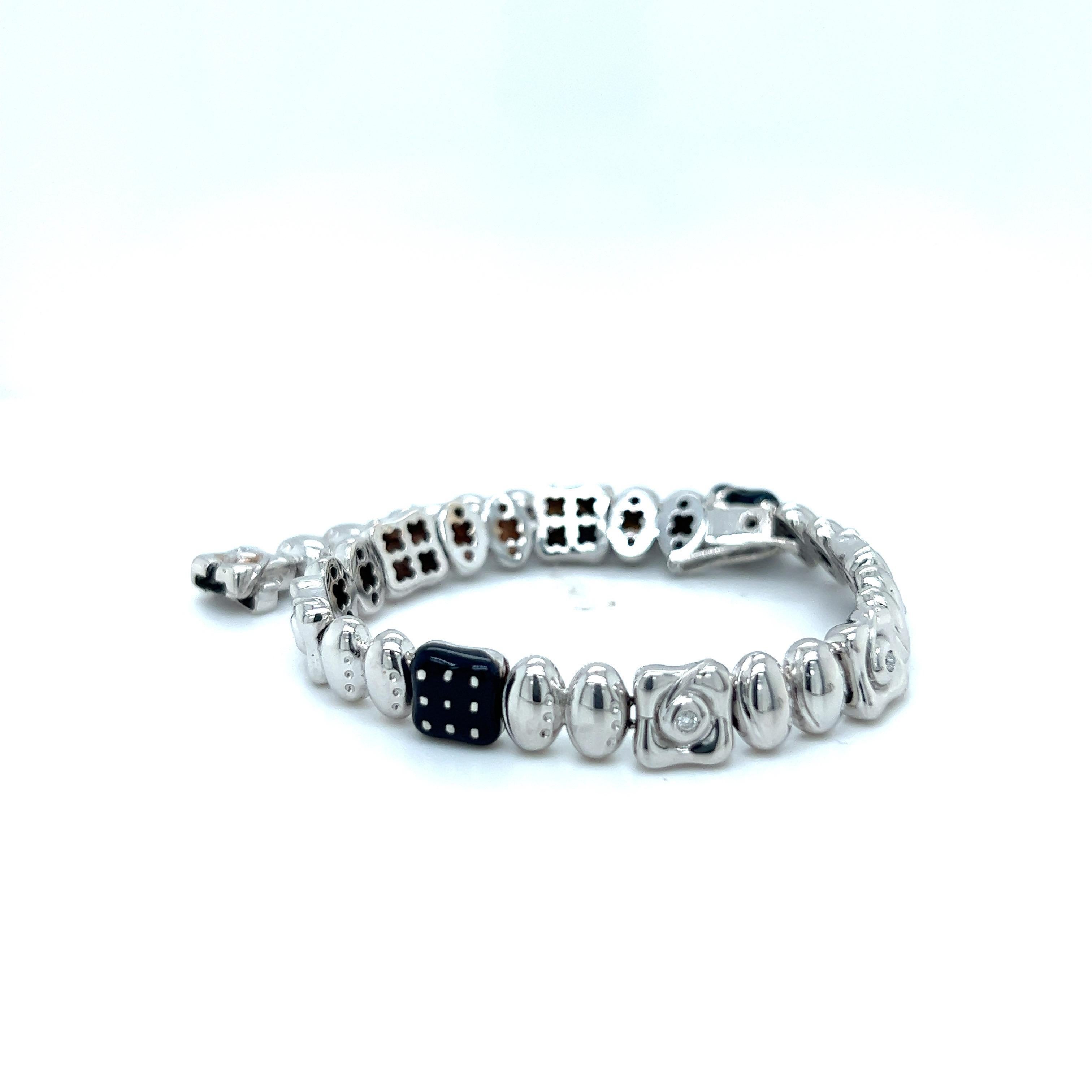 This  18 karat white gold bracelet is designed by the world renowned Italian company La Nouvelle Bague. They are known for their exquisite craftsmanship, marrying the classic with the modern.
This link bracelet is from their Fiori collection.