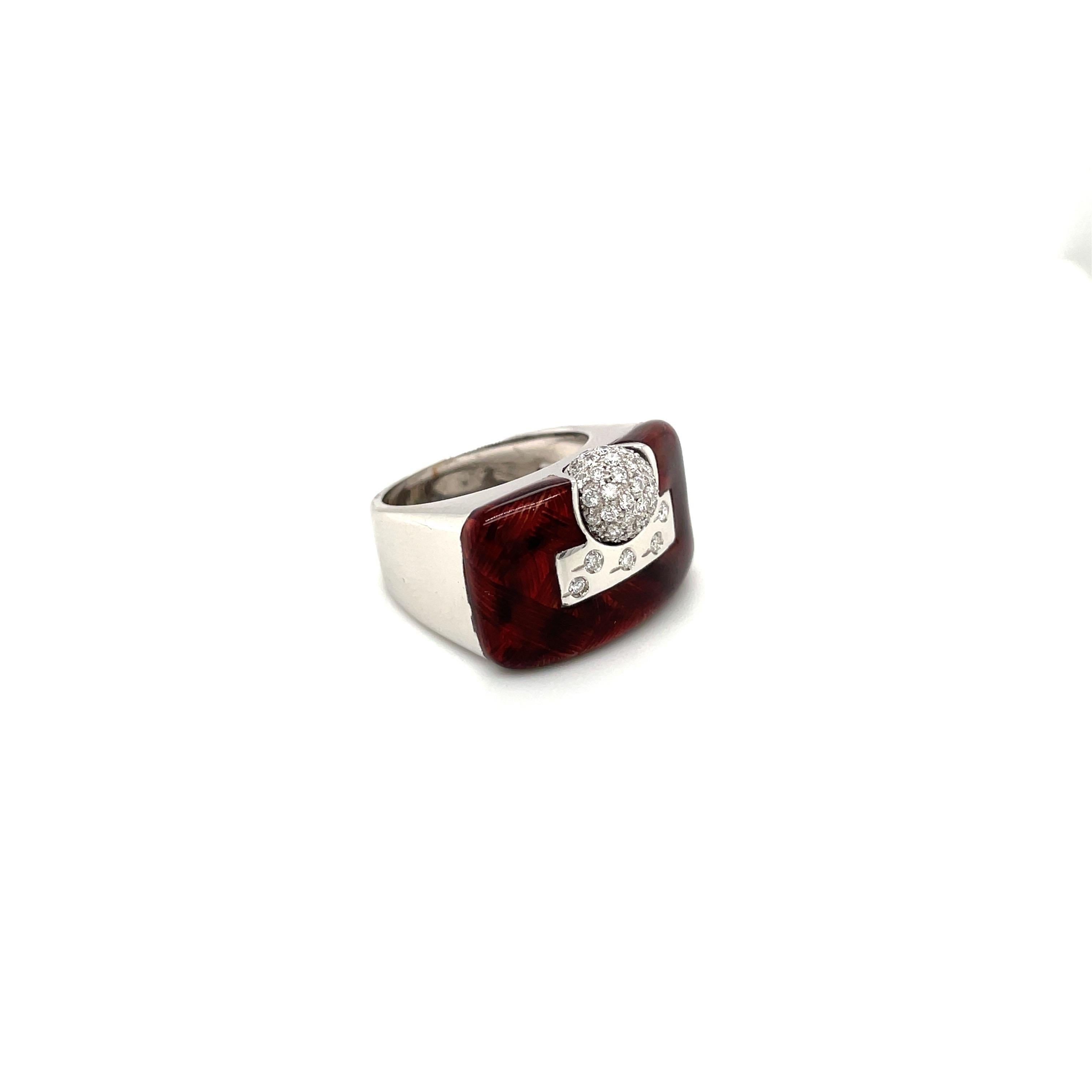 This 18 karat white and  gold ring is designed by the world renowned Italian company La Nouvelle Bague. They are known for their exquisite craftsmanship, marrying the classic with the modern.
This ring is designed in a high polished white gold. The