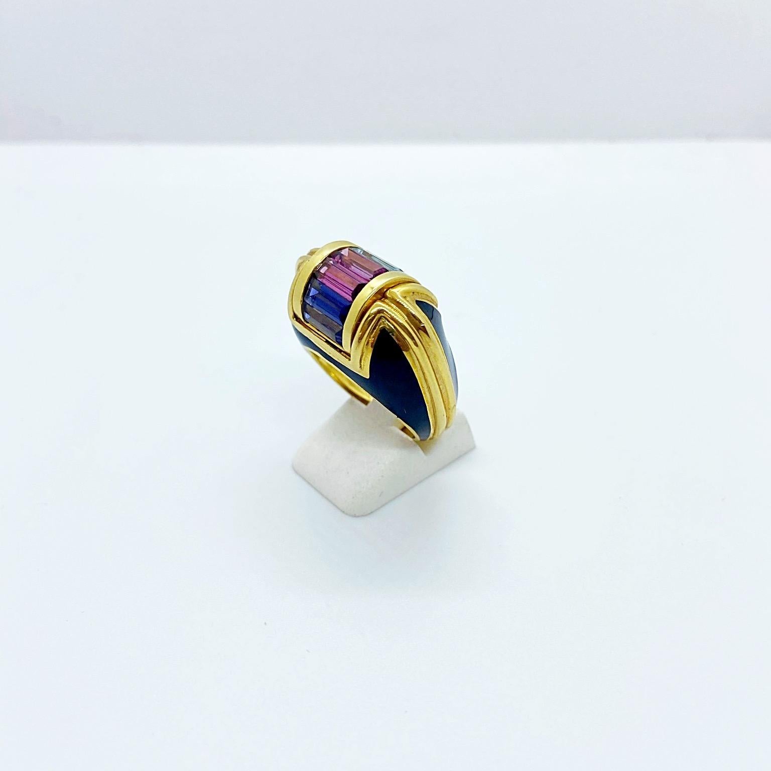 This magnificent  18 karat yellow gold ring is designed by the world renowned Italian company La Nouvelle Bague. They are known for their exquisite enamel work,  and their unique signature style marrying the classic with the modern.
The dome shaped