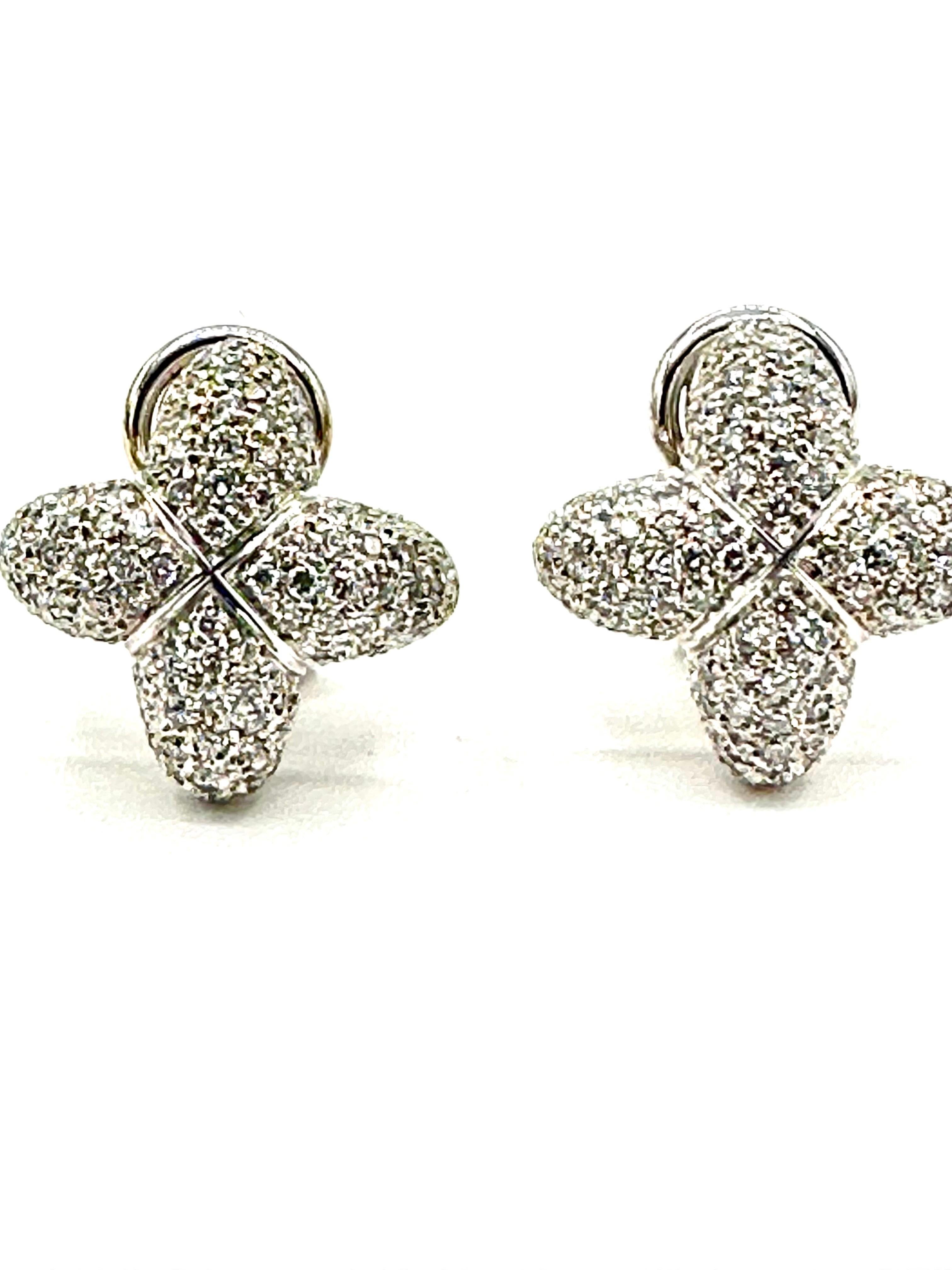 These beautiful La Nouvelle Bague pave Diamond earrings produce sparkle like the stars in the night!  The pave set round brilliant cut Diamonds have a total weight of 3.50 carats, set in 18K white gold.  The Diamond are graded as F color, VS