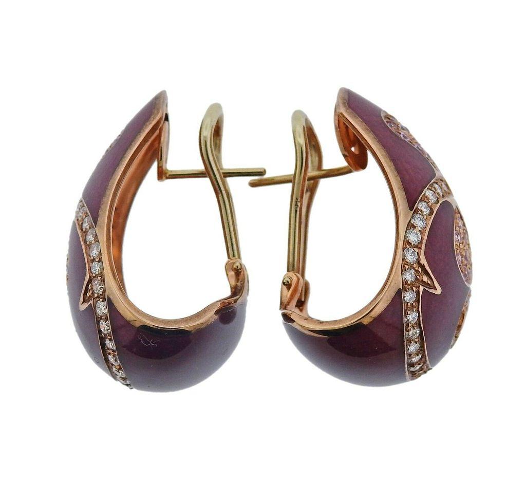 Pair of 18k gold hoop earrings by La Nouvelle Bague, decorated with enamel, pink sapphires and 0.57ctw in H/VS diamonds.
~ Brand new, Store sample. ~
Earrings are 26mm long x 20mm at widest point. Weight is 17.2 grams. Marked Maker's