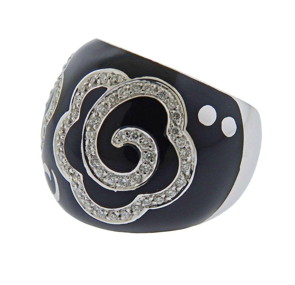 18k gold and black enamel ring by La Nouvelle Bague, set with 0.79ctw in H/Vs diamonds.
~ Brand new, Store sample.  ~
Ring size - 7, ring top is 23mm wide.  Weight is 21.3 grams. Marked 18Kt, LNB mark, Italian mark. 