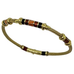 La Nouvelle Baugue Classic Bangle in 18 Karat Gold and Enameled Brow and Blu