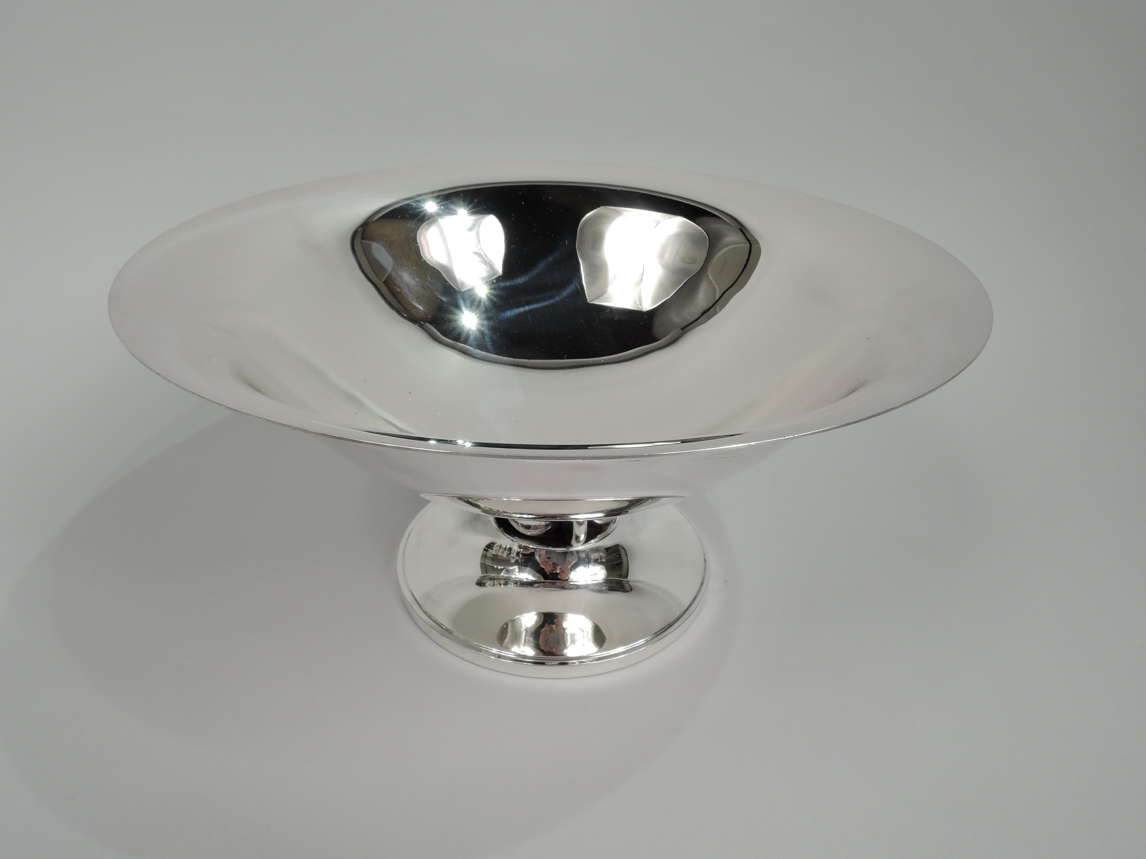 Midcentury Modern sterling silver bowl. Designed by Alphonse La Paglia (d. 1953) for International Silver Co. in Meriden, Conn. Curved and tapering sides and flared rim. Short open support comprising alternating ring and bead surmounted by two small