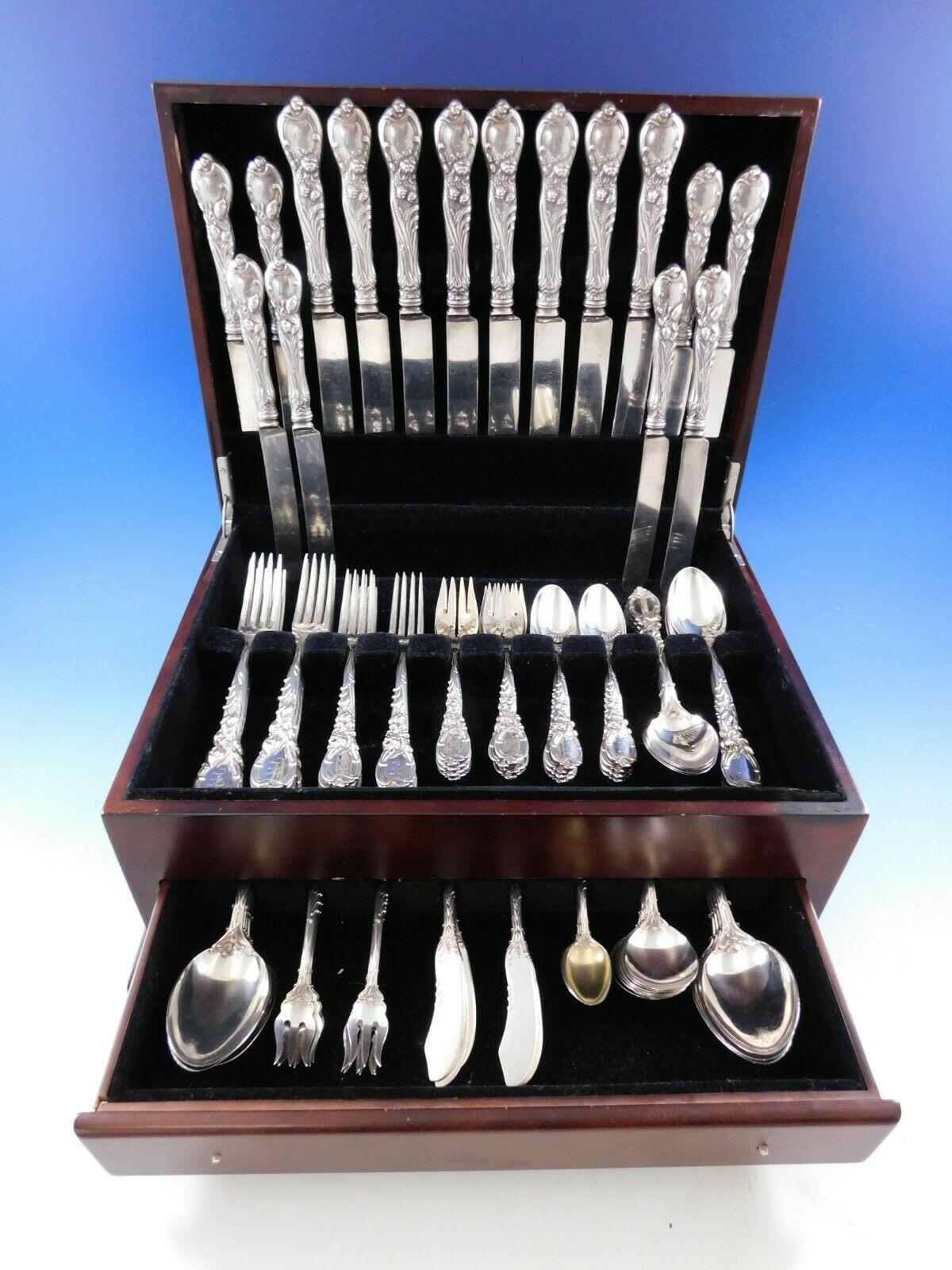 La Parisienne by Reed and Barton sterling silver dinner size flatware set, 96 pieces. This Art Nouveau, multi-motif, floral pattern is circa 1902. This set includes:

8 large dinner size knives, 10 1/4