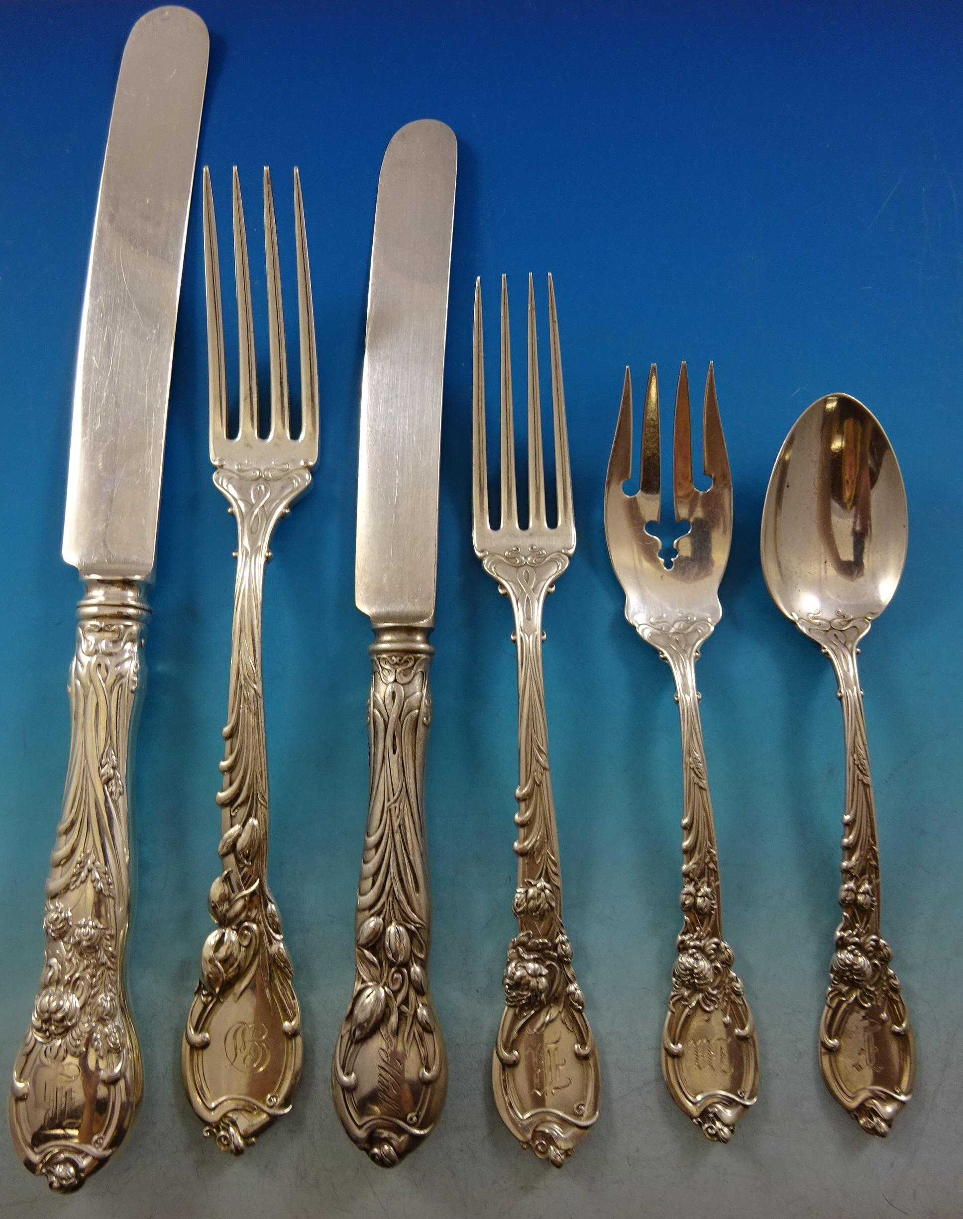 La Parisienne by Reed and Barton Sterling Silver Dinner Size flatware set - 130 pieces. This Art Nouveau, multi-motif, floral pattern is circa 1902. This set includes:

12 Banquet Size Knives, 10 1/4