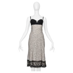 Robe mi-longue bustier en dentelle noire et ivoire La Perla, 2006