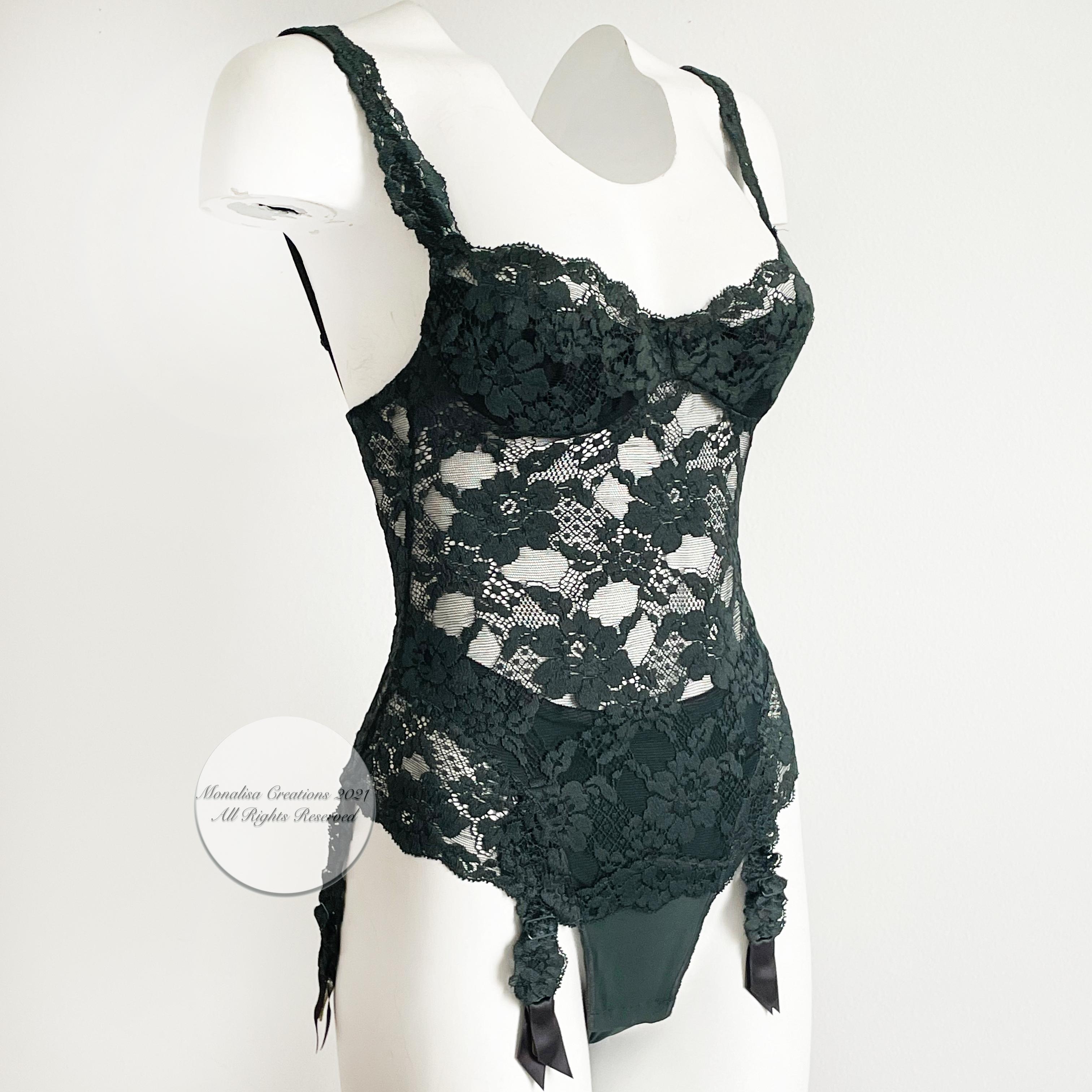 La Perla body suit with bra and garter straps, most likely made in 2003.  Made from a stretchy and gorgeous floral lace, the forest green color is so unique! New with tags/new old stock.  Tagged US 34.    Measurements (appx taken flat and doubled