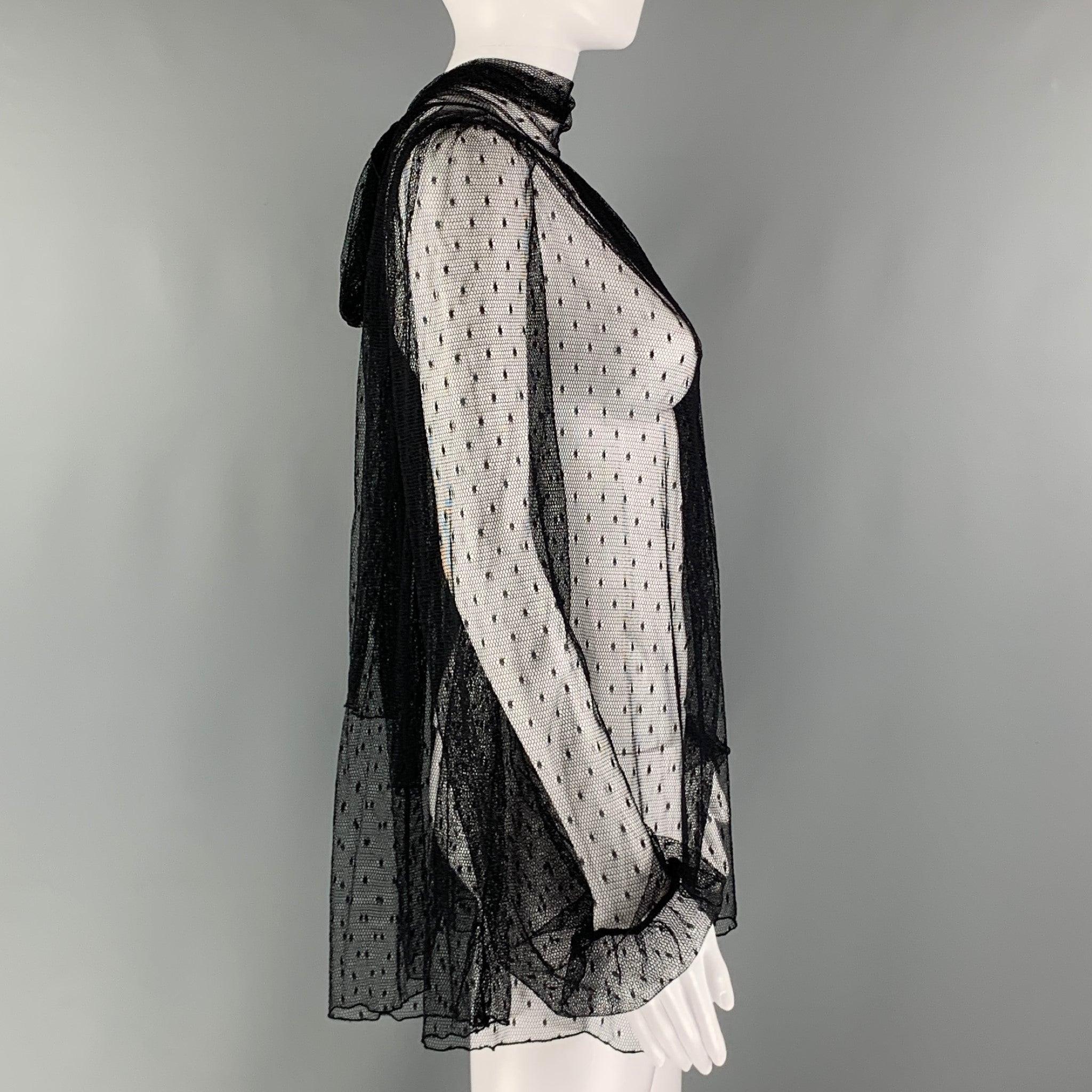 LA PERLA COLLEZIONE
long sleeves shirt comes in black polka dots mesh knit material featuring an oversized style, elastic cuff, see through style, high neck, and bow tie detail at back. Made in Italy.Excellent Pre-Owned Condition.  

Marked:   40