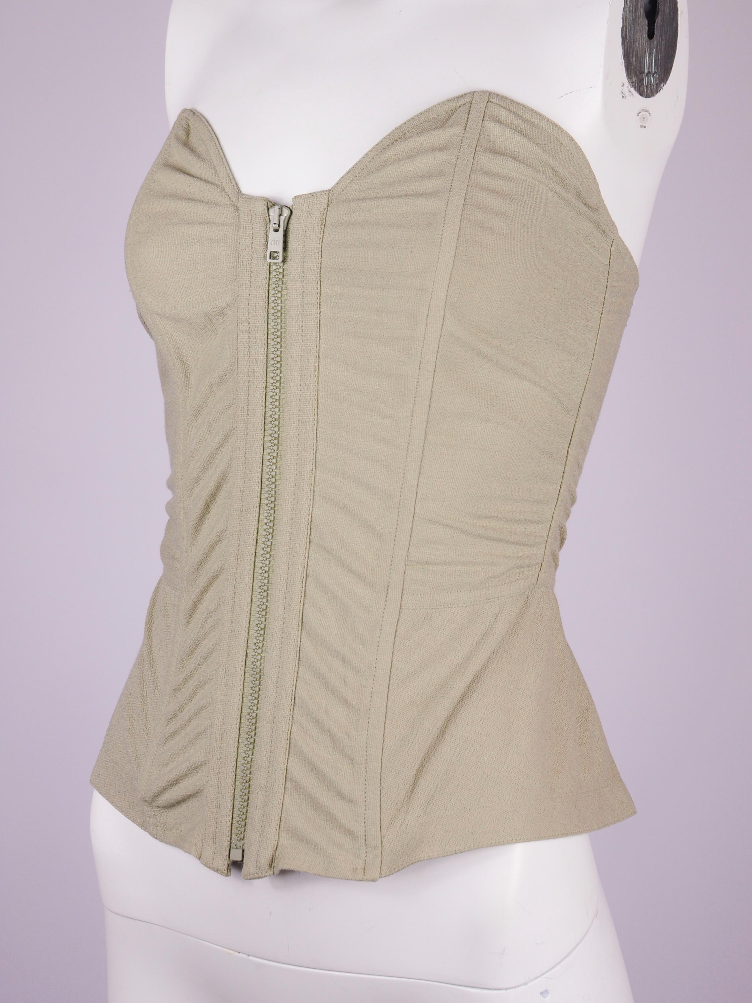 La Perla corset top in beige linen and cotton blend  from the early 1990s. This La Perla corset is deadstock, meaning it is new with tags and has never been worn before. It is reinforced with boning. The zipper opens all the way so it’s easy to put