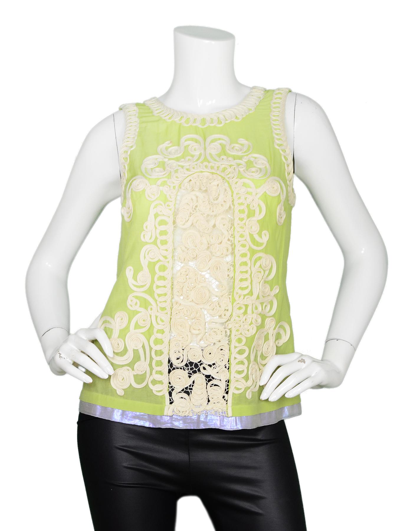 La Perla Green Embroidered Sleeveless Top Sz 42

Made In: Italy
Color: Green, ivory 
Materials: 75% cotton, 25% silk
Opening/Closure: Button up back
Overall Condition: Very good pre-owned condition with exception of some staining on front, see