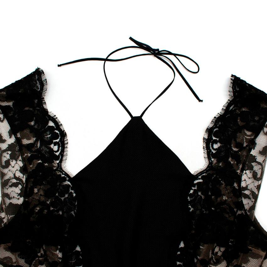 La Perla Halterneck nightgown in black silk with Leavers lace

- Nightgown in silk with Leavers lace
- Halterneck
- Lined
- Lace sleeve panels 
- Full length
- Low back 
- Buttoned back 
- PR sample item 

Materials 
100% Silk 
Lining: 100% Nylon