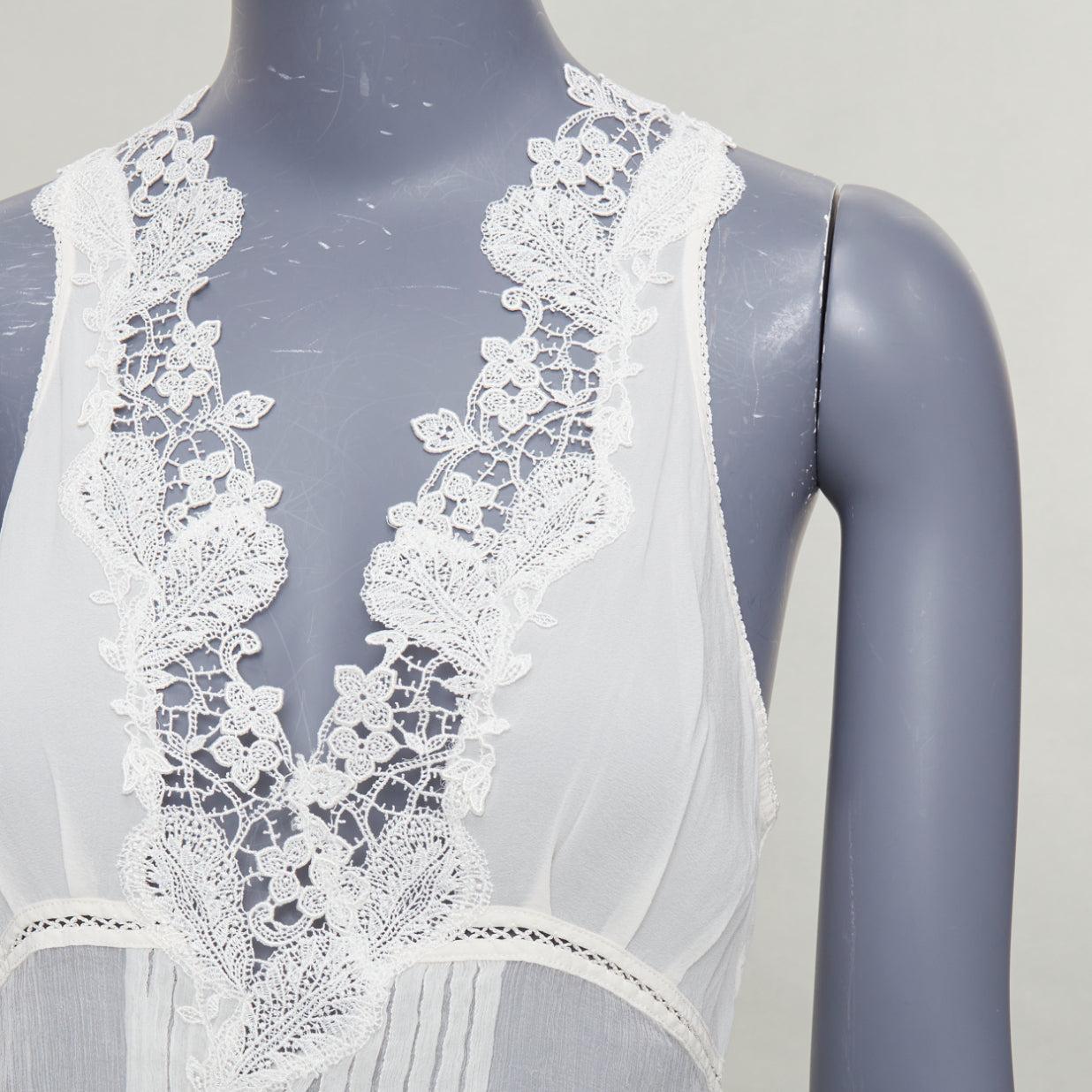 LA PERLA Creme Seide verwickelt floralen Spitze trimmen plissiert tief V zurück ausgeschnitten Tank Top Sz1 XS
Referenz: NKLL/A00512
Marke: La Perla
MATERIAL: Fühlt sich an wie Seide
Farbe: Creme
Muster: Floral
Verschluss: Slip On
Zusätzliche