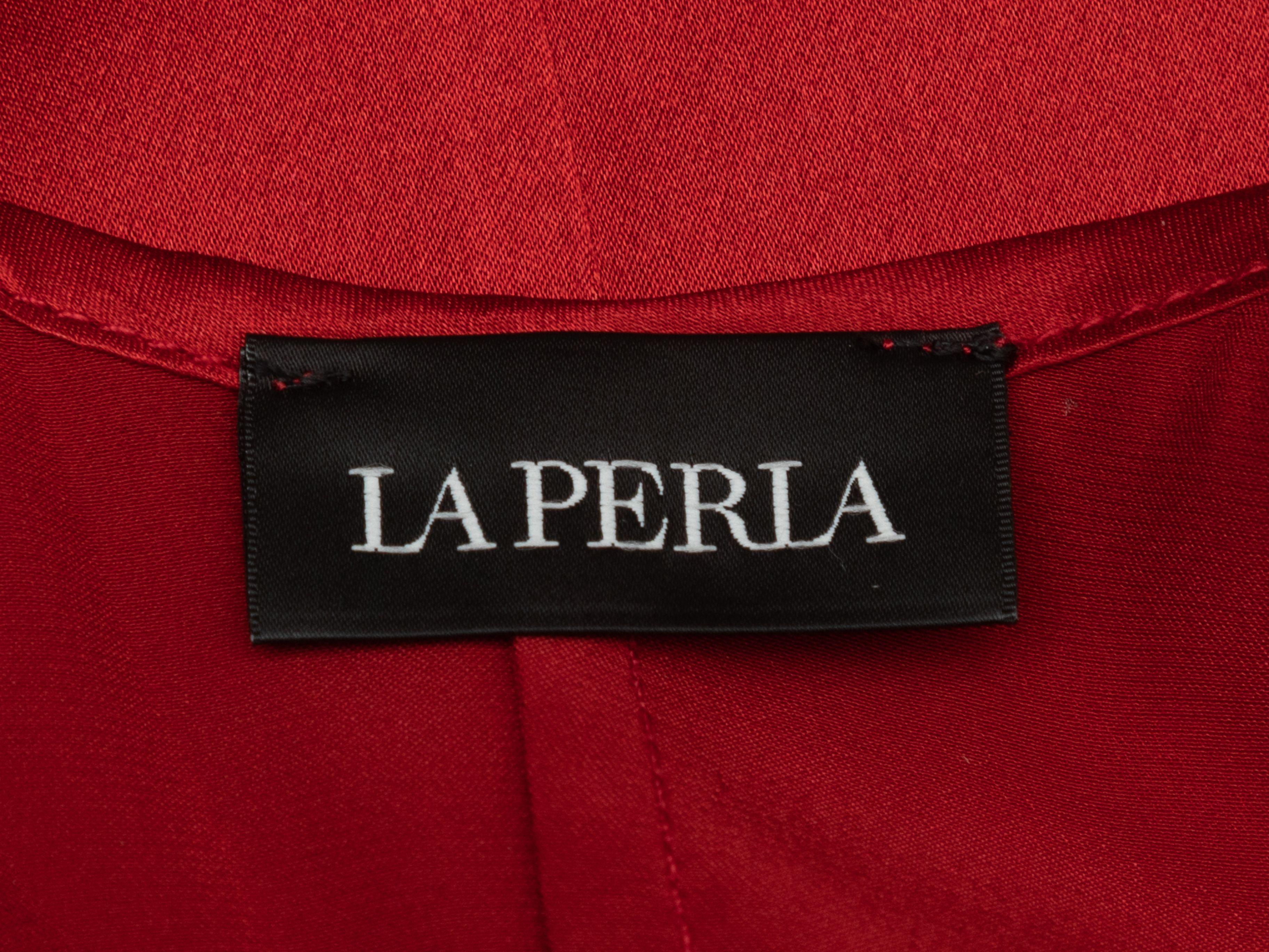 Product Details: Red silk sleeveless slip dress by La Perla. Scoop neckline. Adjustable straps. 38