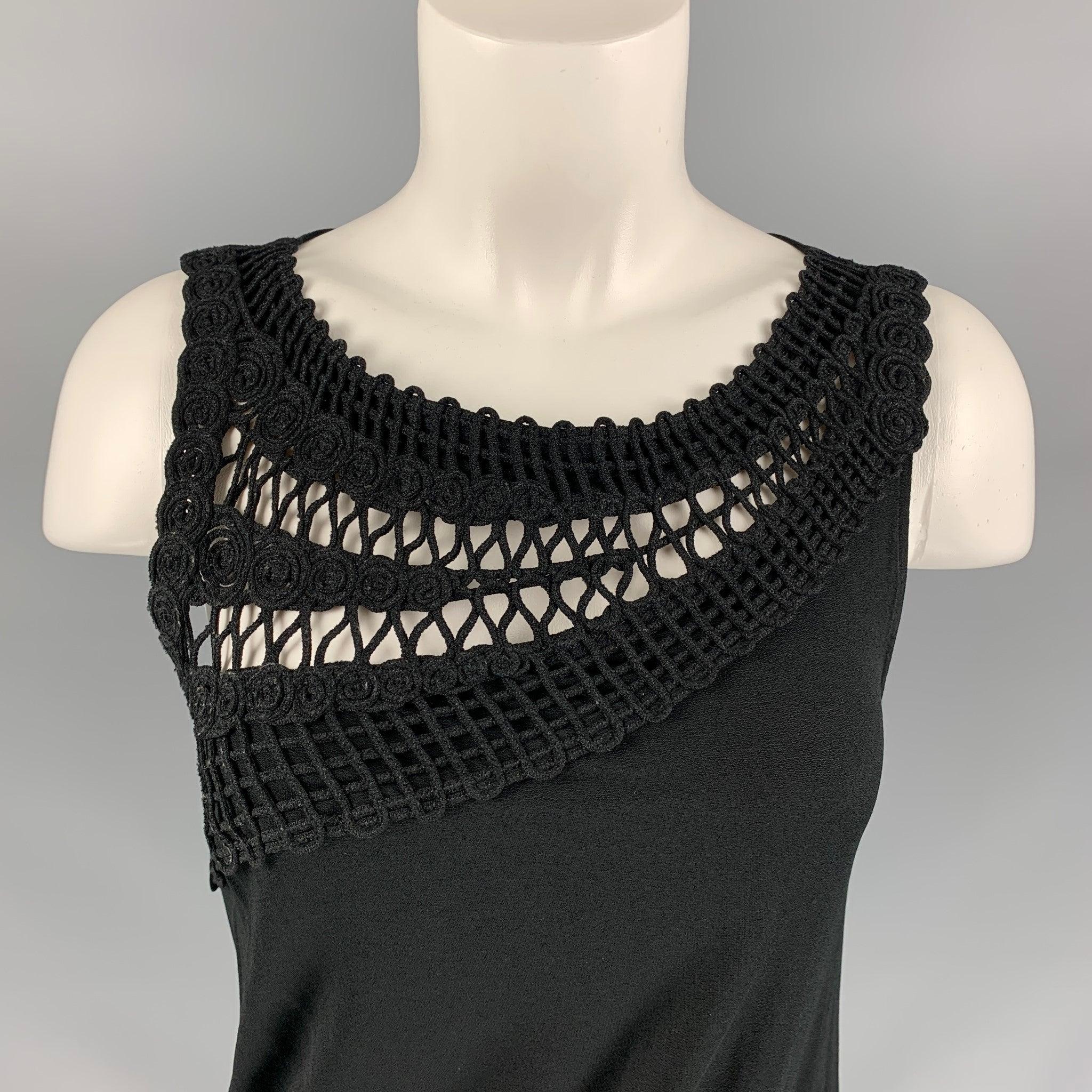 LA PERLA cocktail dress in a black rayon blend jersey featuring a ruched bottom and crochet neckline. Made in Italy.
Excellent Pre-Owned Condition. 

Marked:   IT 42  

Measurements: 
 
Shoulder: 13 inches Bust: 33 inches Waist: 36 inches Hip: 38