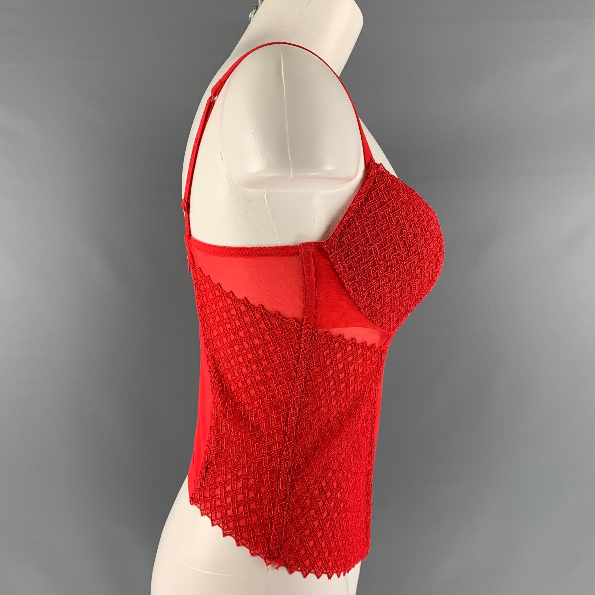 LA PERLA corset dress top comes in red polyamide knitted material featuring a mixed texture and zip up closure at center back.Excellent Pre-Owned Condition. 

Marked:  3 IT 

Measurements: 
 Bust: 28 inches Length: 13 inches 
 
 
 
 
Reference: