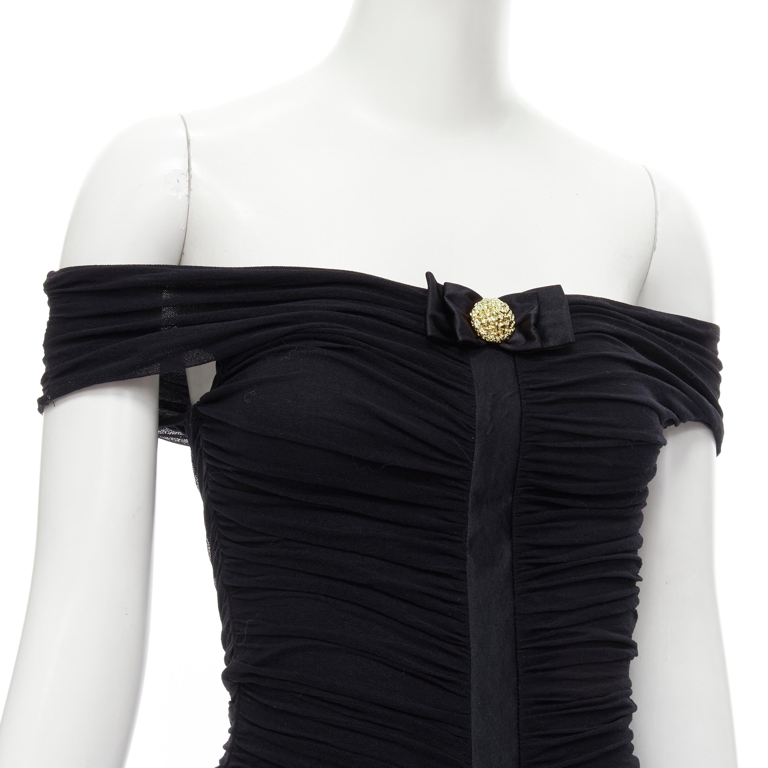 LA PERLA Vintage black gold button bow off shoulder ruched bodycon tunic IT42 M 
Reference: GIYG/A00140 
Brand: La Perla 
Material: Polyamide 
Color: Bkacj 
Pattern: Solid 
Extra Detail: Gold-tone button decorative bow. Ruched tulle. 
Made in: Italy