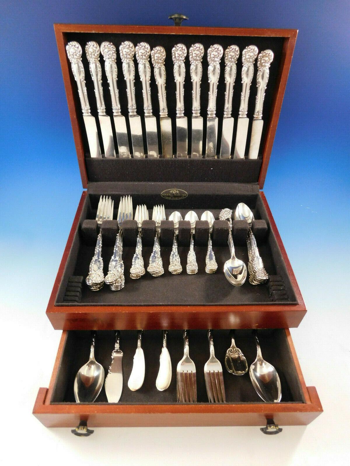 Dinner size La Reine by Reed & Barton sterling silver flatware set, 88 pieces. This set includes:

12 dinner size knives, 10