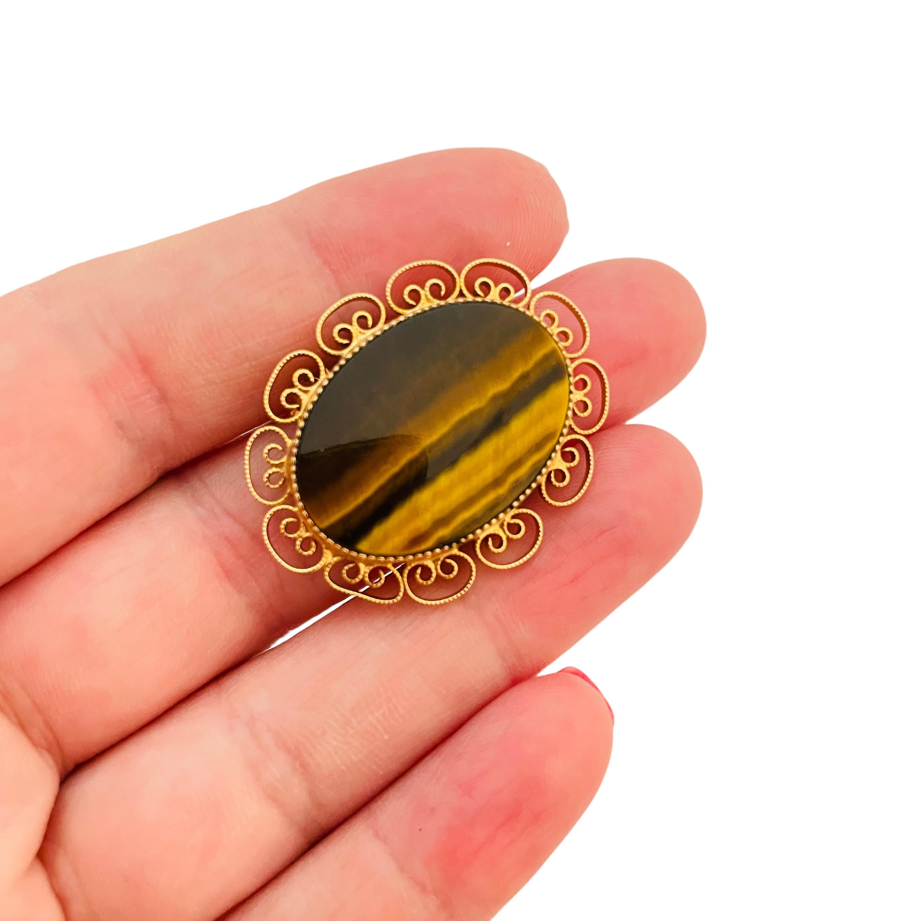 DETAILS

• signed LA REL 1/20 12kt gold filled

• gold filled with tiger eye stone

• vintage designer brooch
  

MEASUREMENTS  

• 

CONDITION

•  very good vintage condition with minimal signs of wear 

 Sku 32

❤️❤️   VINTAGE DESIGNER JEWELRY  