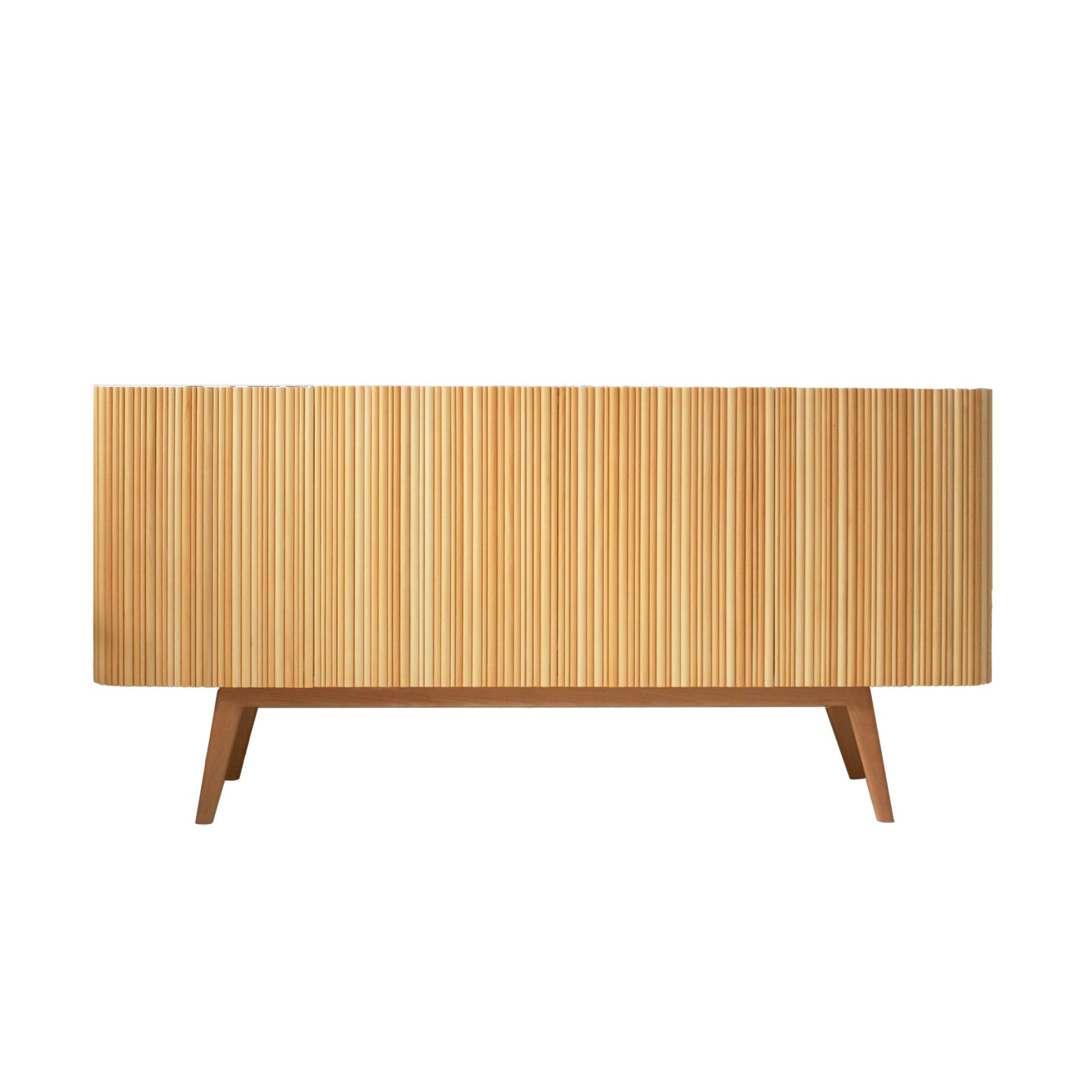 Sideboard designed by L.A. Studio, with a linden texture semicircular profile sitting on the surface, making handles hidden. Composed of four folding doors and one wooden shelf inside. The outside is made of linden and the inside is lemongrass wood.