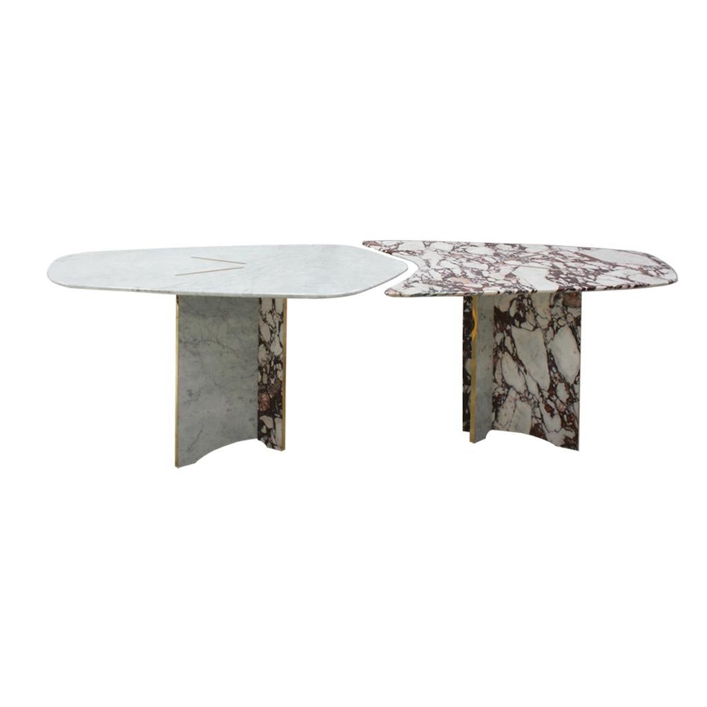Dining table composed of two sculptural pieces of pink and white arabescato marble with brass details. This stunning table can be converted into a one composed table or in two separate pieces. Manufactured in Italy.