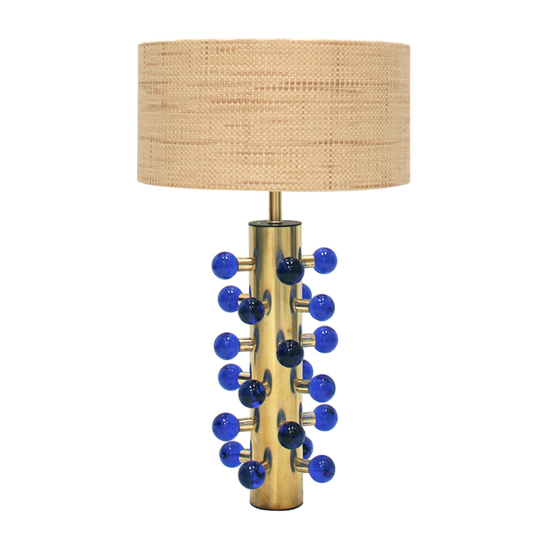 Stunning pair of table lamps designed by L.A. Studio. Structure made of brass with blue Murano glass spherical pieces.

Every item LA Studio offers is checked by our team of 10 craftsmen in our in-house workshop. Special restoration or reupholstery