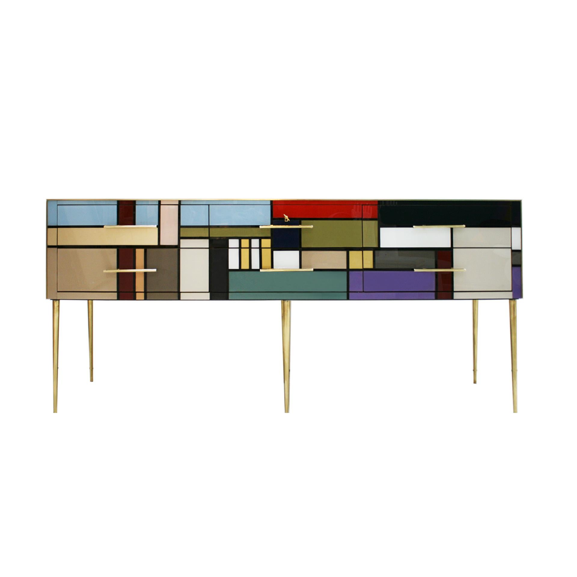 Italian sideboard with six drawers and six legs, with wooden structure covered in colored Murano glass, profiles, handles and feet in brass. Italian manufacture.

Our main target is customer satisfaction, so we include in the price for this item