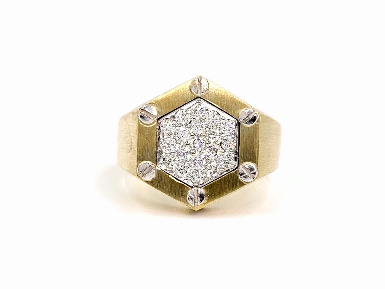 Well crafted genuine La Triomphe 18 karat two tone hexagon shaped gold ring featuring .55 carats of round brilliant high quality diamonds. Diamonds are approximately F color, VS2 clarity. Diamonds are set with white gold prongs for an extra bright