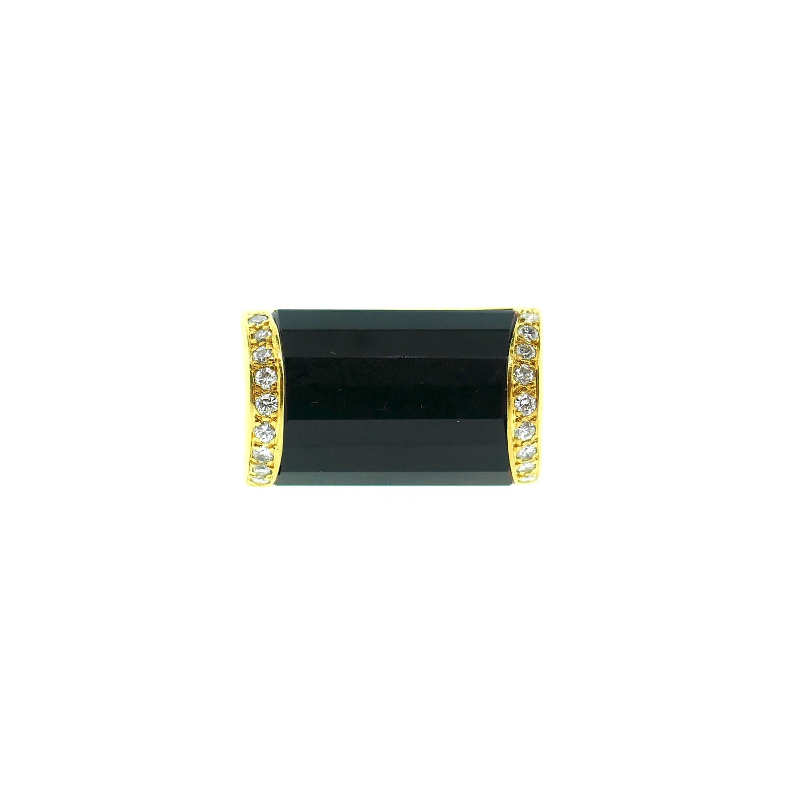 La Triomphe 18 Karat Yellow Gold Diamond Faceted Onyx Ring

This is a beautiful large La Triomphe ring. It features faceted onyx as a center stone surrounded on two sides by excellent quality diamonds. 

Weight: 13.3 Grams

Size: 6 US

Signature /